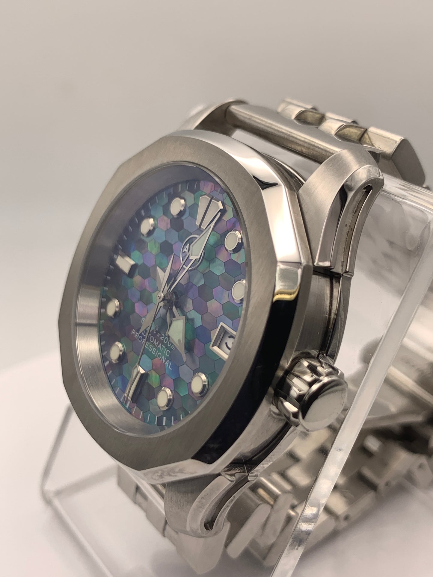 Spectrum. Mosaic mother of pearl dial. 38mm Stainless steel case. Sapphire crystal. NH35 automatic movement.