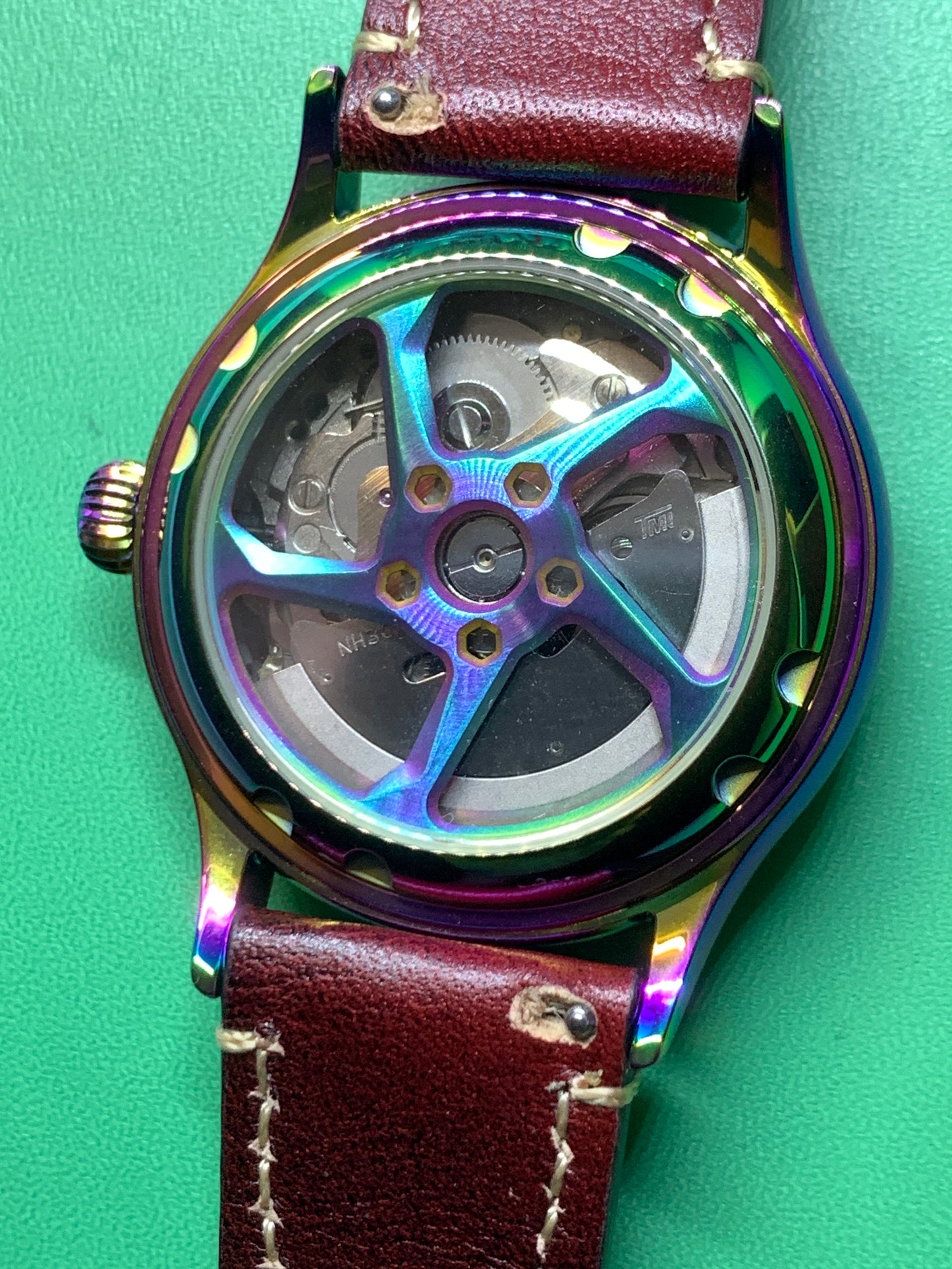 Living Color. 38mm thermally colored stainless steel case and case back. Double dome K-1 mineral crystal. Seiko NH36