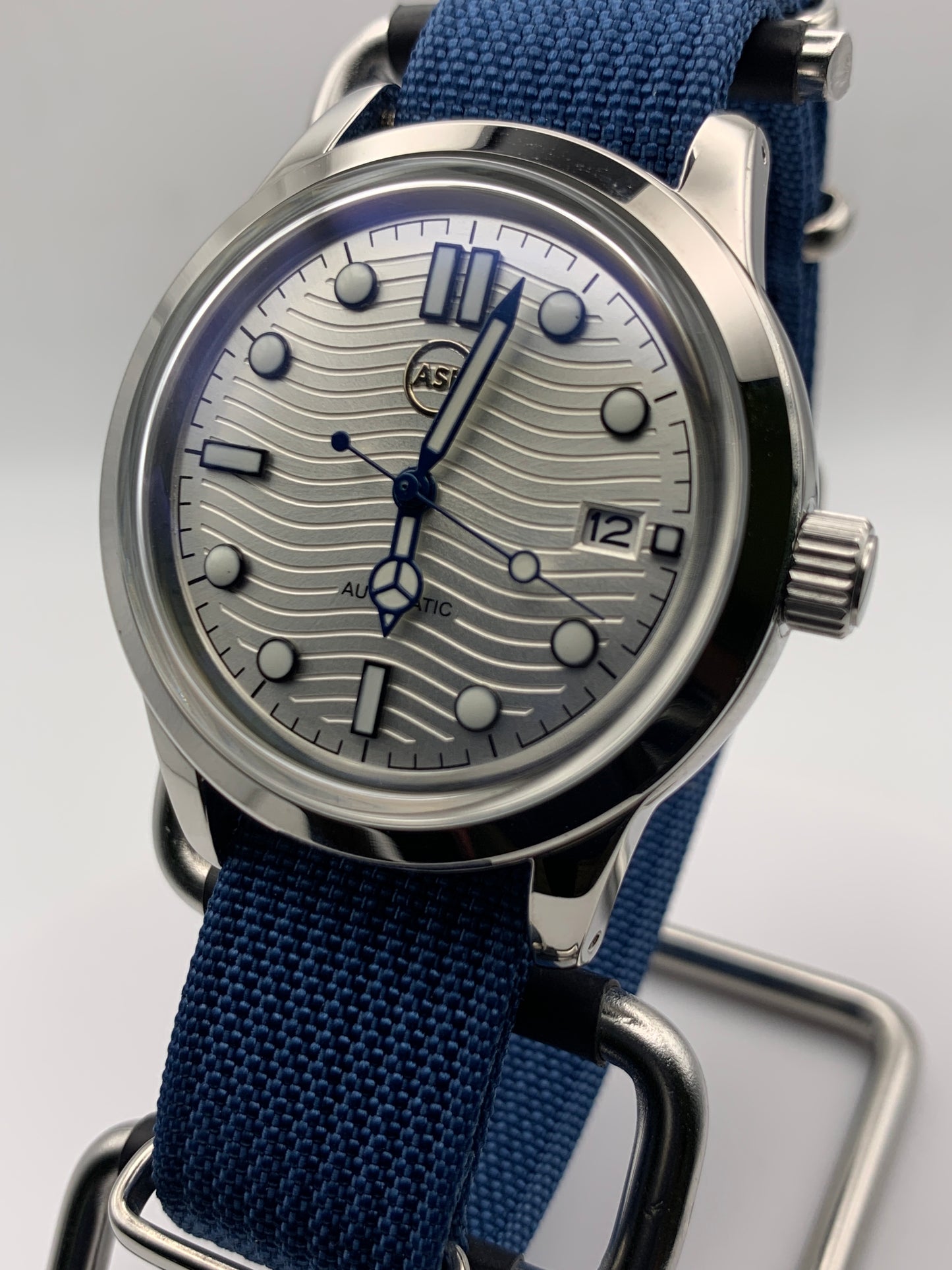 The Yankee 1.2 - Blue, silver and white livery. 39mm stainless steel case. K-1 mineral crystal with AR. NH35 automatic.