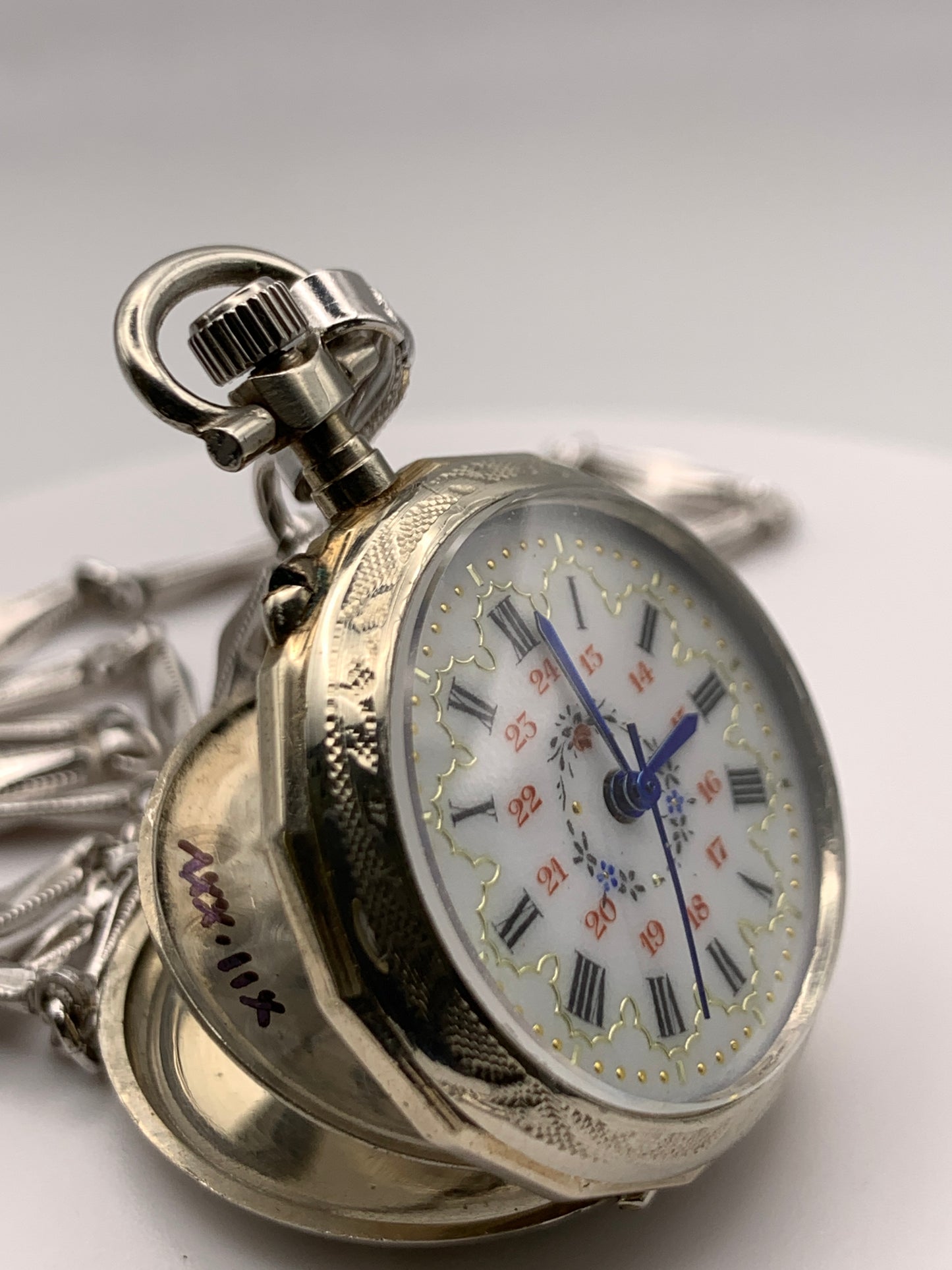 ‘Sold - Amuse-bouche. 30mm pocket / necklace watch. NOS Argentan alloy case and hand painted enamel dial. Sapphire crystal. Miyota 2036. 24” sterling necklace.