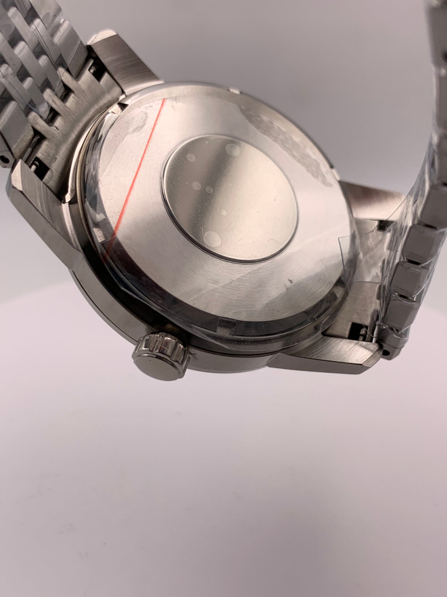 Nocturne. 40mm stainless steel case with matching bracelet. Box sapphire crystal. Seiko NH35