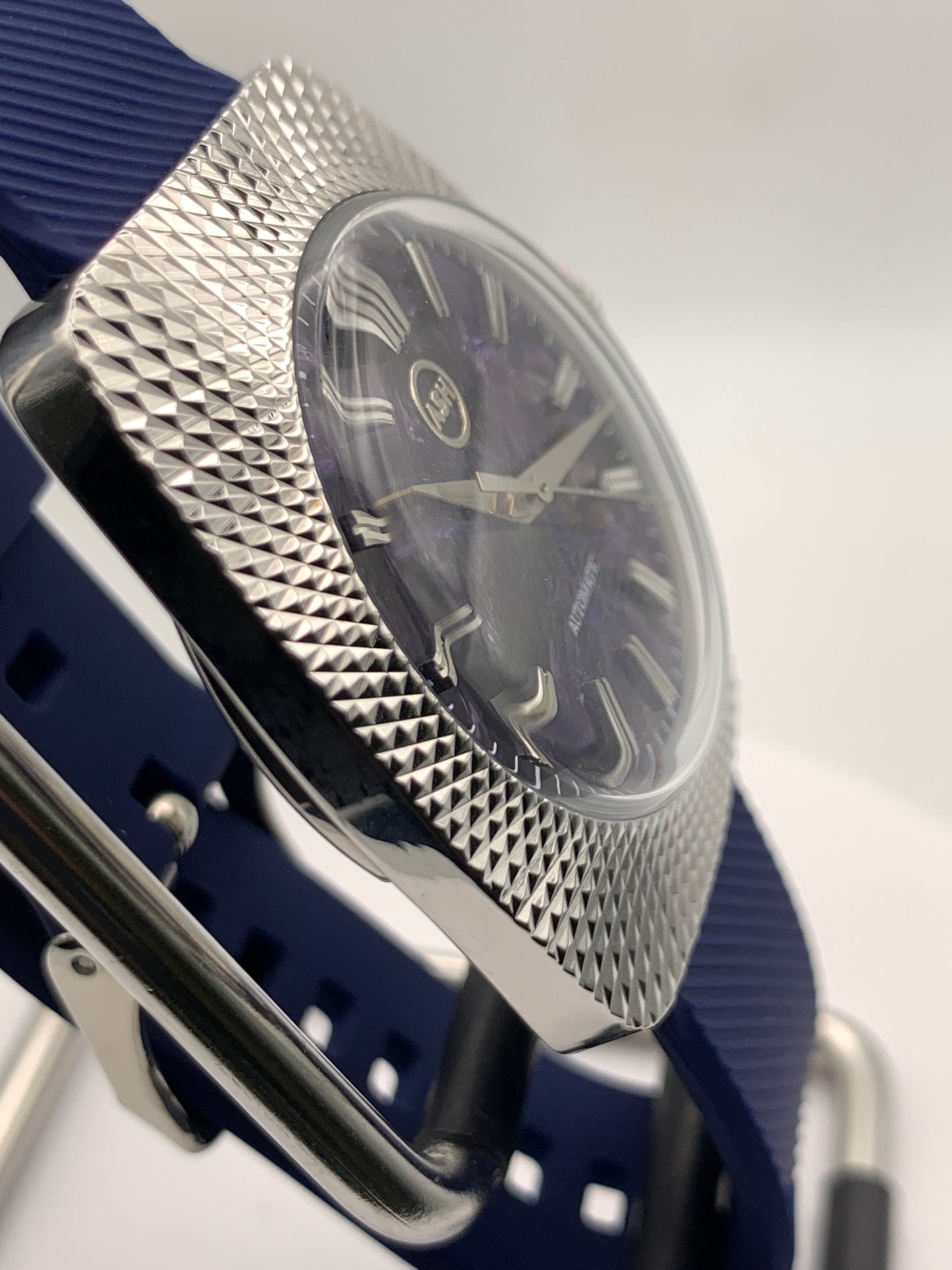 Lily 1.1 - Faceted 37mm stainless steel case. Acrylic domed crystal. Charlotte stone dial.  Seiko NH38.