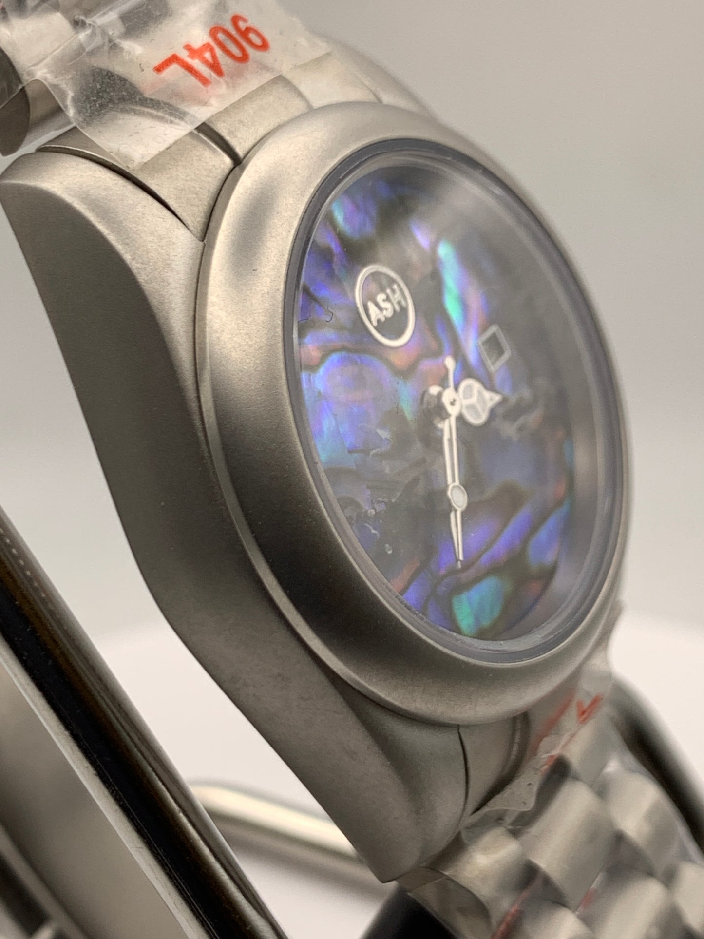 Microcosm. 31mm Brushed stainless steel with matching bracelet. Sapphire crystal. Seiko NH05 automatic.
