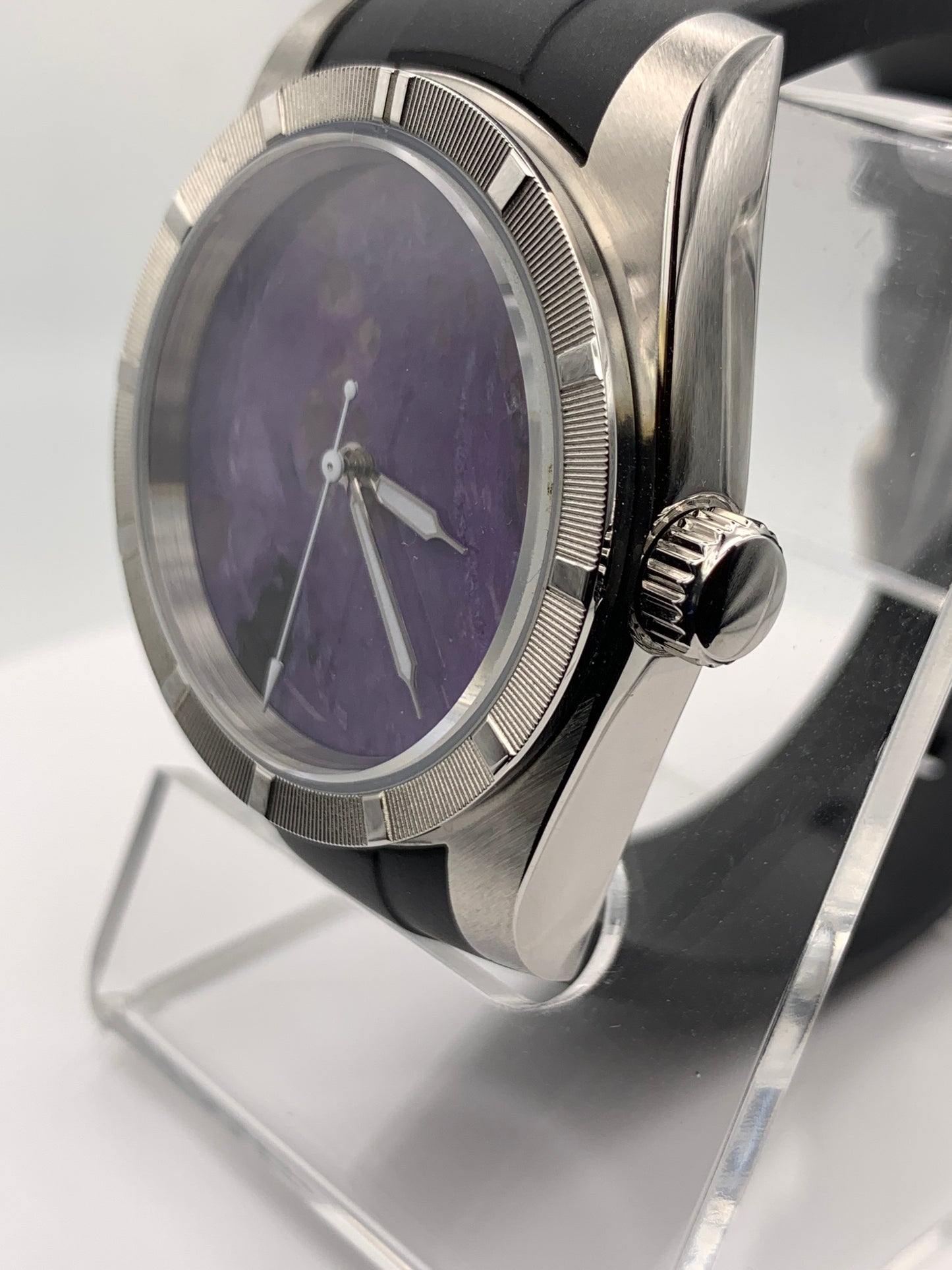 Purple natural stone dial. 39mm engine turned case.