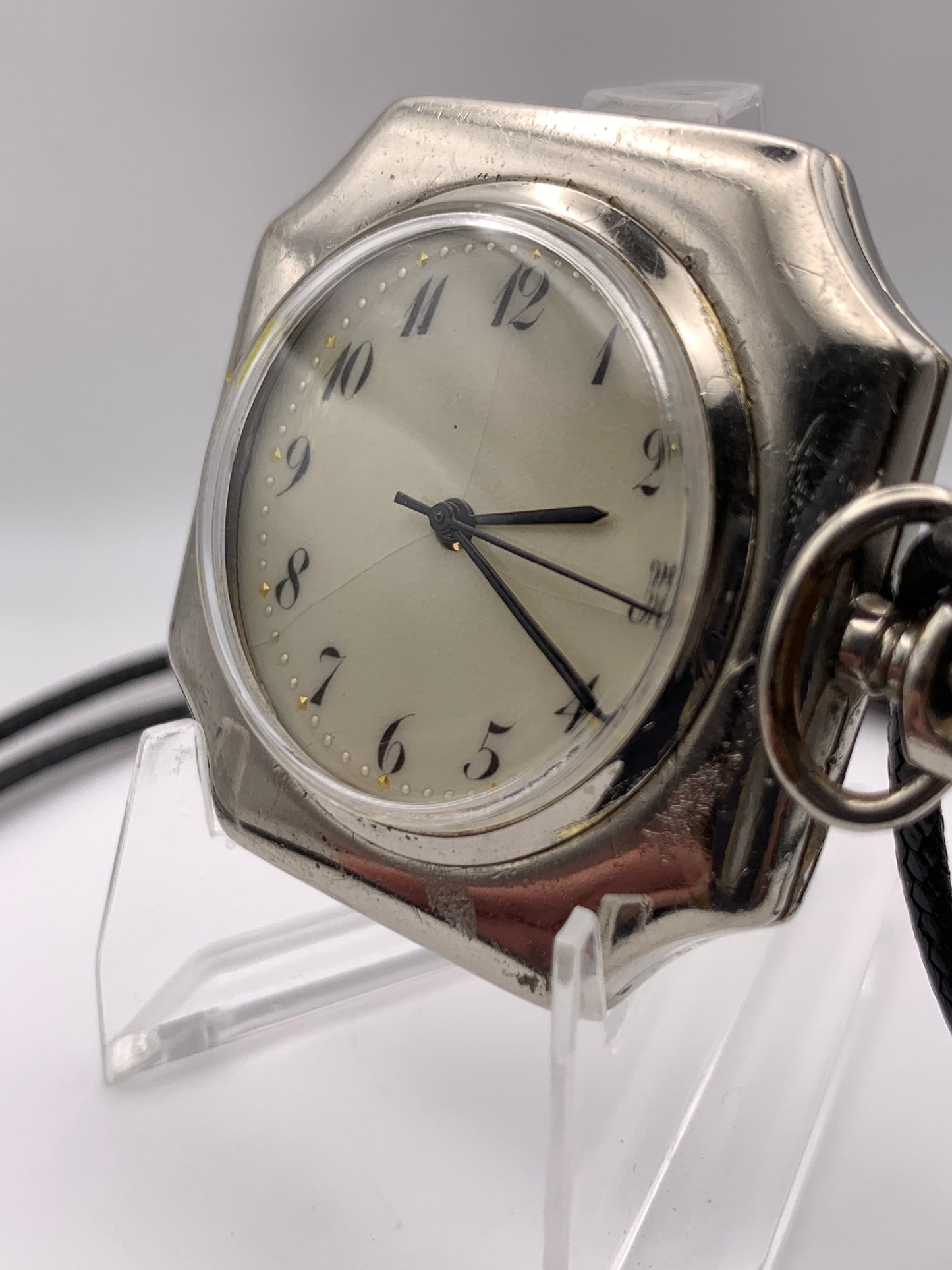 Palimpsest.  40 x 40mm plated brass case. Vintage pendant watch conversion. Domed acrylic crystal. Original enamel dial. Miyota 2036.