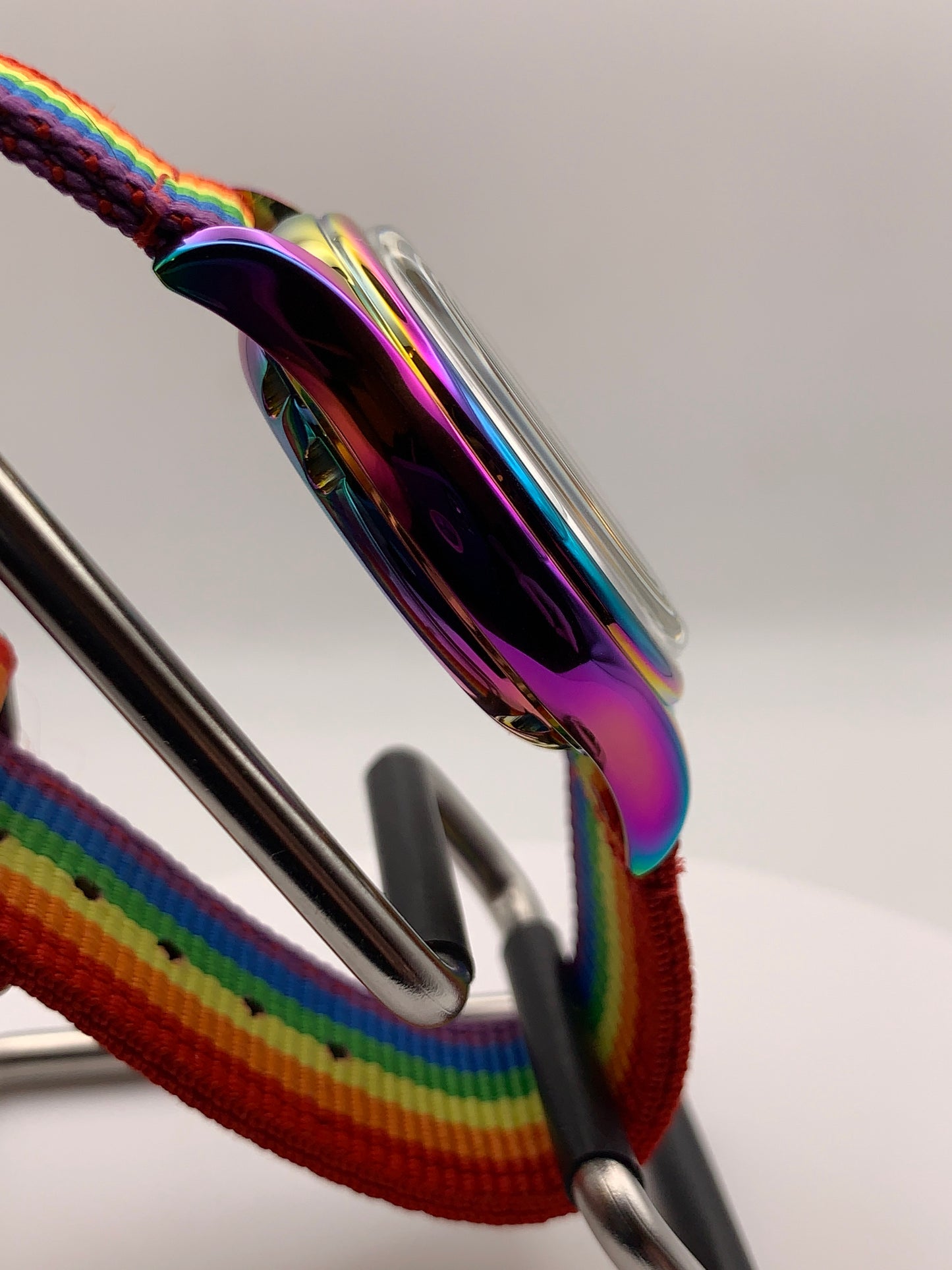 Portable rainbow. 38mm thermally colored stainless steel case and case back. Double dome K-1 mineral crystal. Seiko NH35.