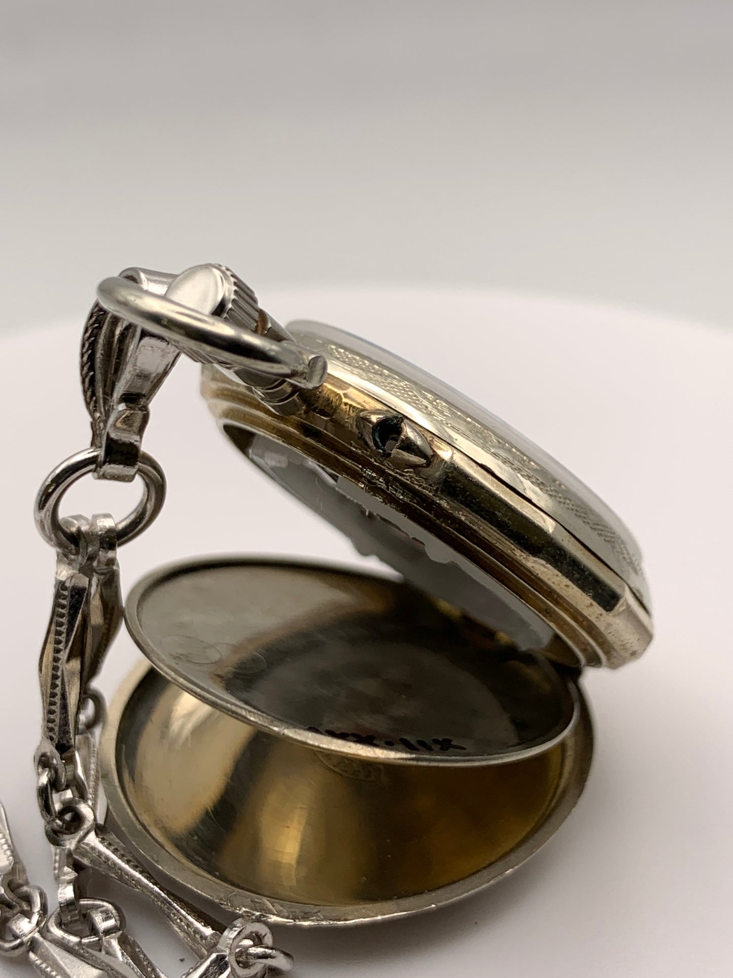 ‘Sold - Amuse-bouche. 30mm pocket / necklace watch. NOS Argentan alloy case and hand painted enamel dial. Sapphire crystal. Miyota 2036. 24” sterling necklace.