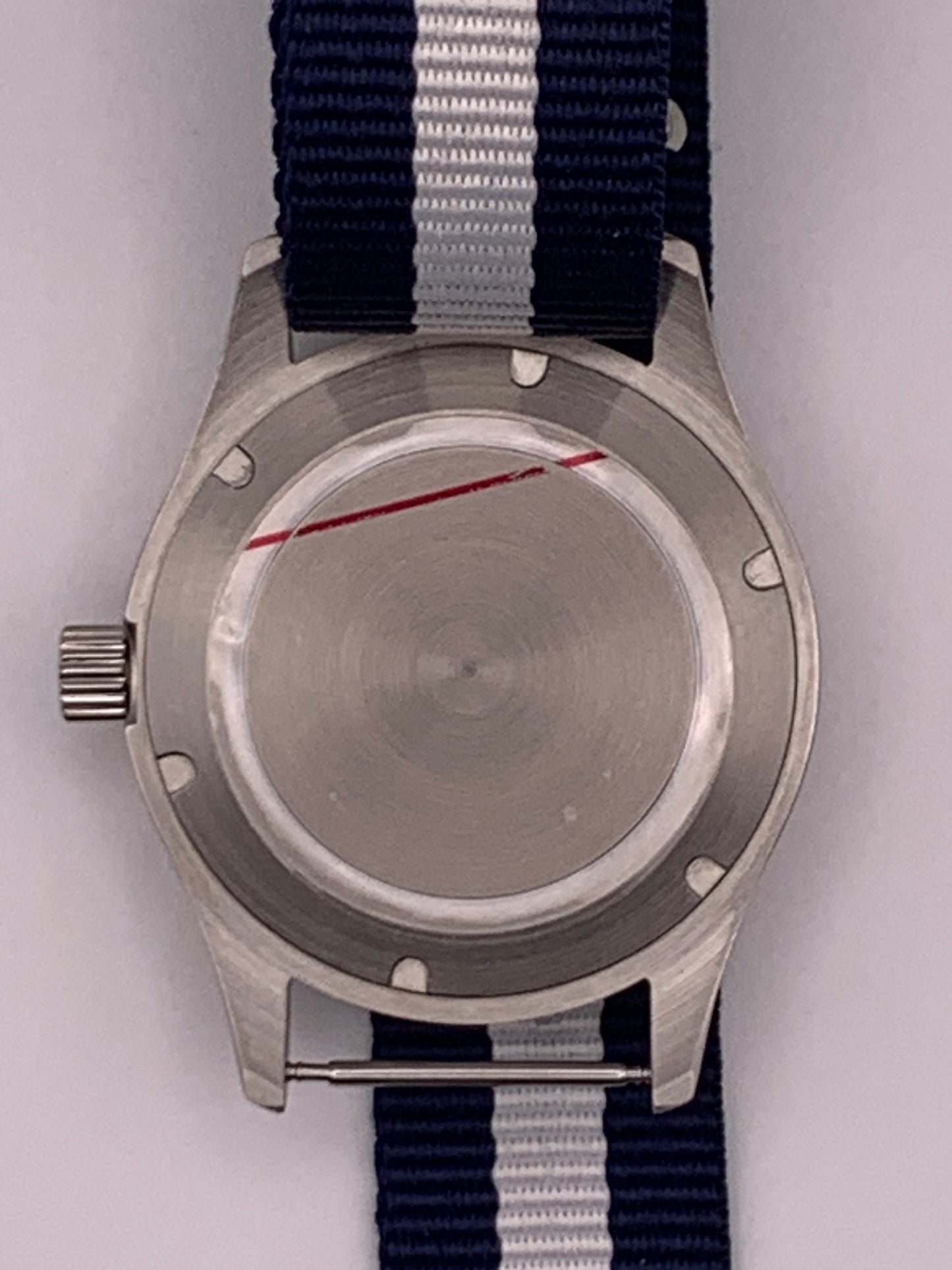Cloth & Steel. 38mm brushed stainless steel. Ornate dial. Sapphire crystal. Seiko NH38