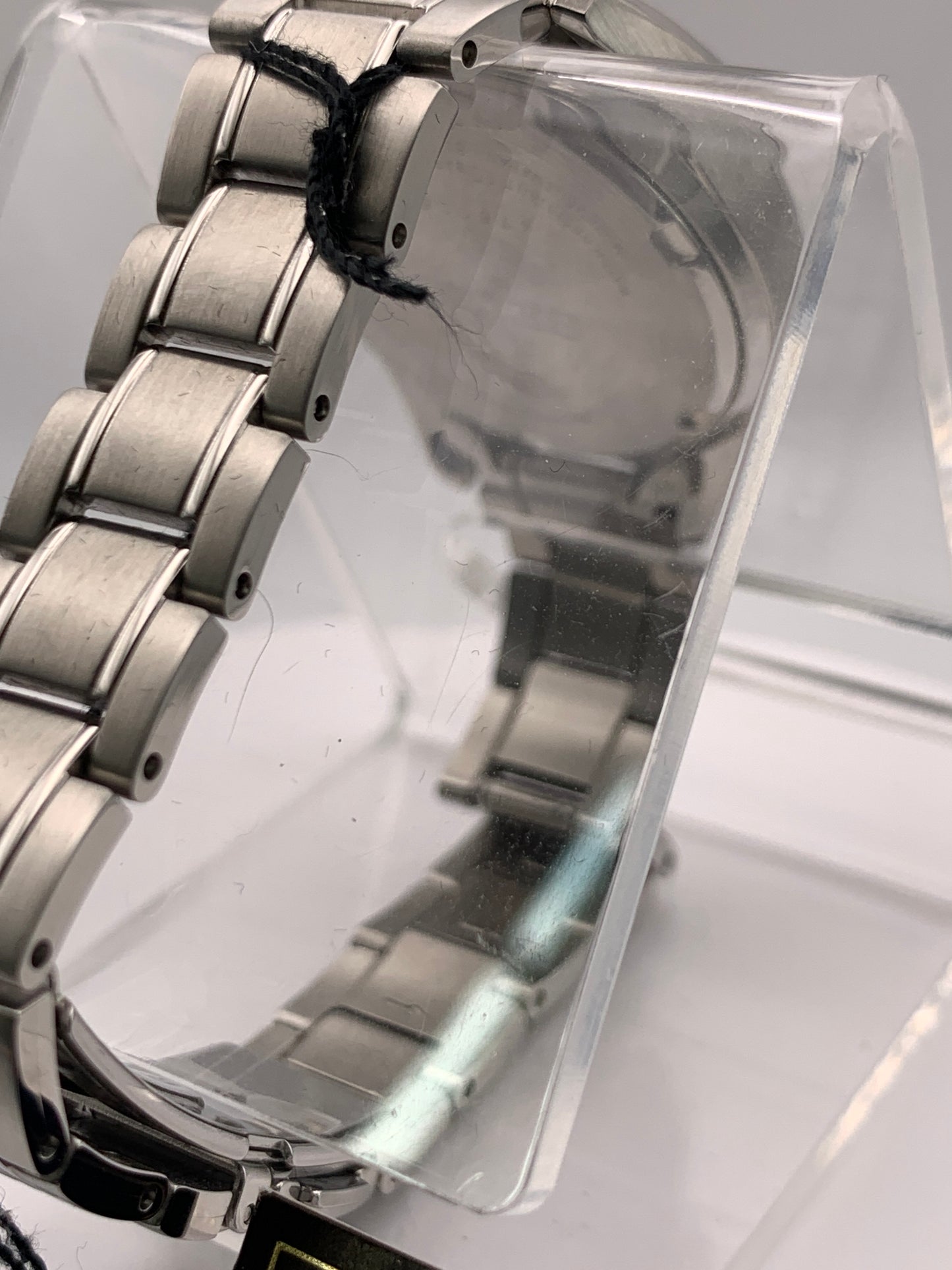 Seiko SUR633- 30mm Stainless steel case. Silver sunray dial. Sapphire crystal. 6n22 quartz movement. 100m water resistance. Box and papers.