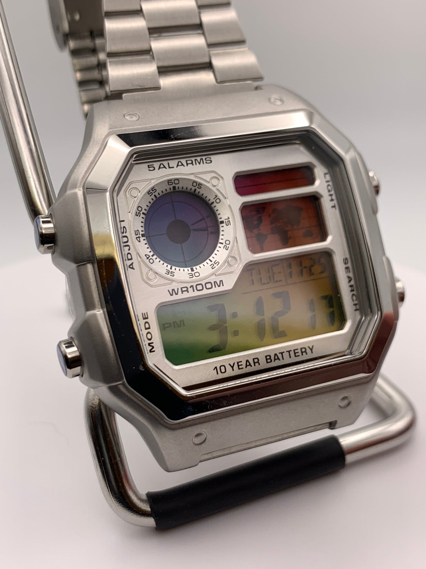 ‘Sold. Royale with Cheese. Casio AE1200. Rainbow filter. Metal case. Silver sunray faceplate. Vintage style bracelet. Flashing alarm upgrade.