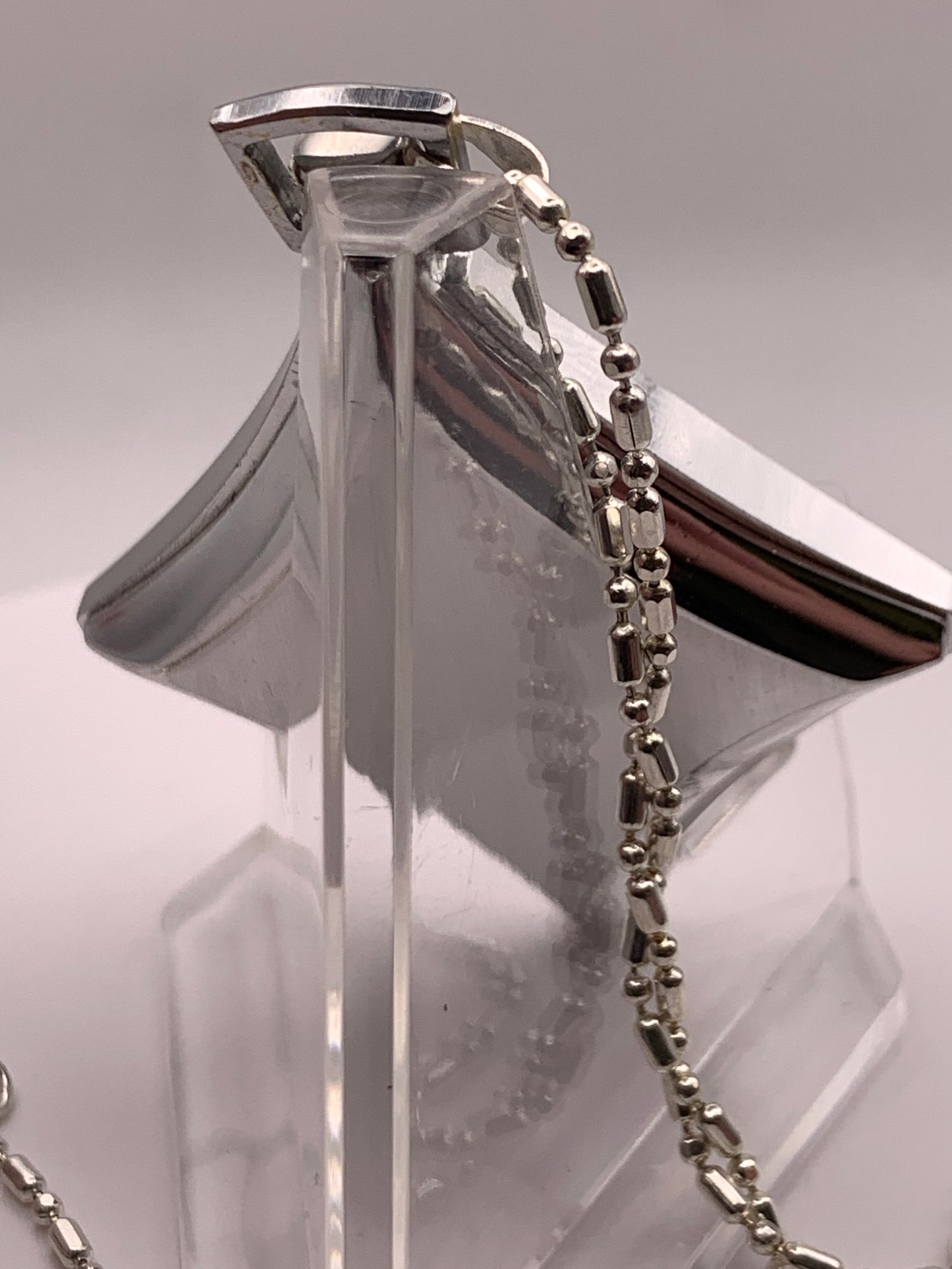 In The Rough. Necklace watch. Domed acrylic crystal. Miyota Super 2035 quartz movement.