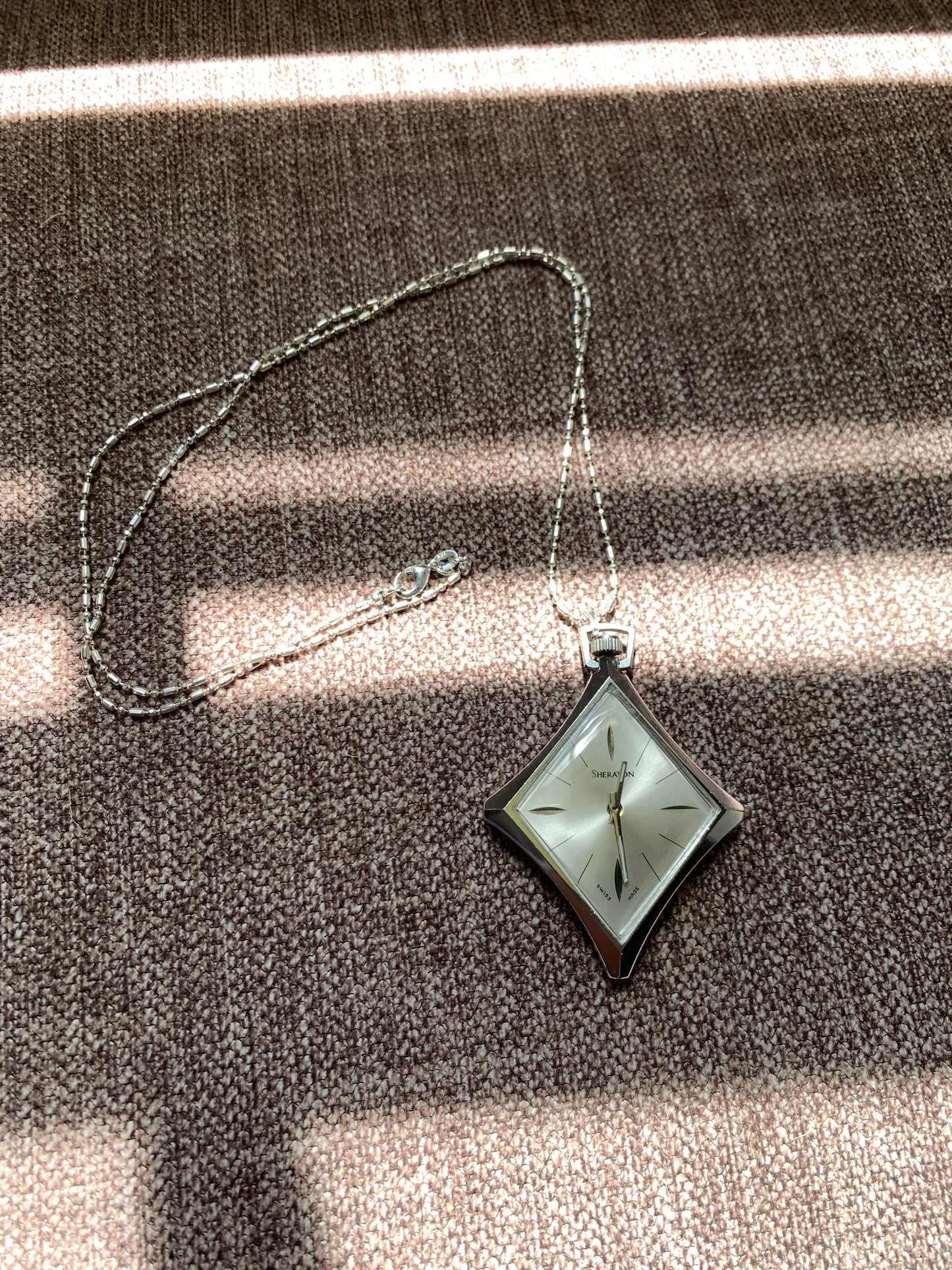 In The Rough. Necklace watch. Domed acrylic crystal. Miyota Super 2035 quartz movement.