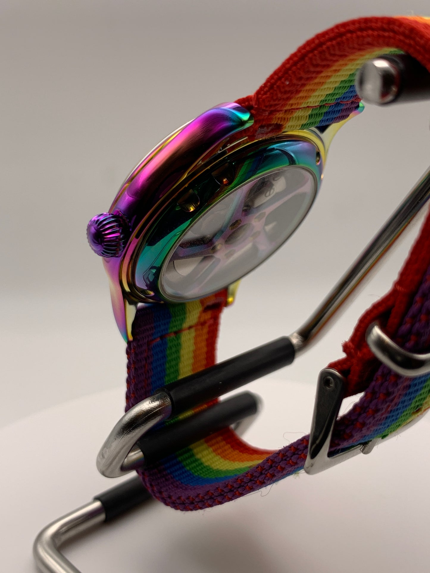 Portable rainbow. 38mm thermally colored stainless steel case and case back. Double dome K-1 mineral crystal. Seiko NH35.