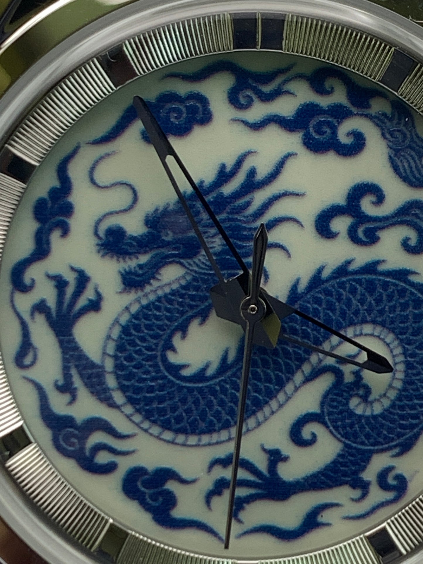 Qinglong - 39mm stainless steel case with engine turned chapter ring. Sapphire crystal. Seiko NH38.