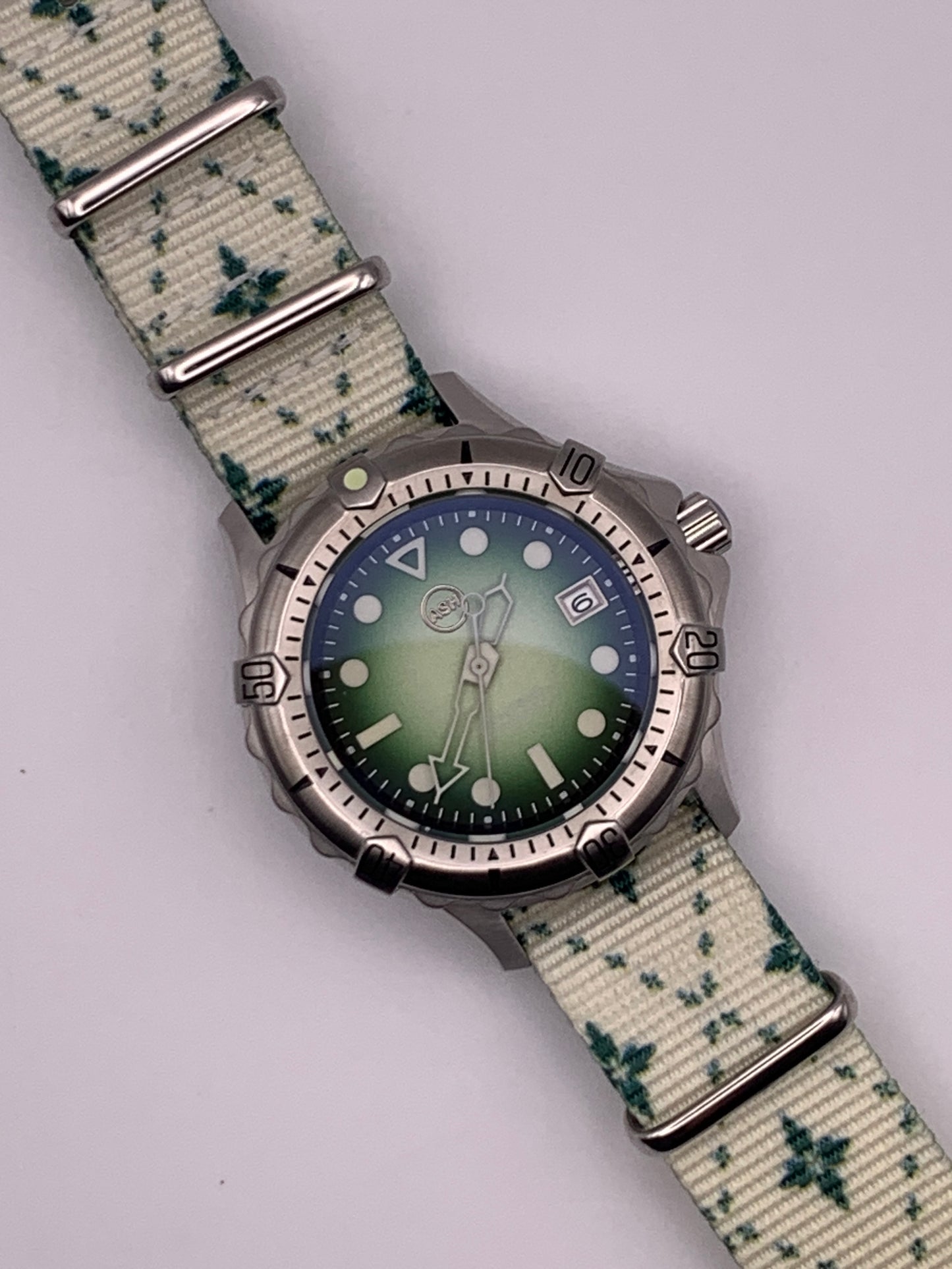 Thymekeeper.  42mm Stainless steel case.  Sapphire crystal. Seiko NH35.