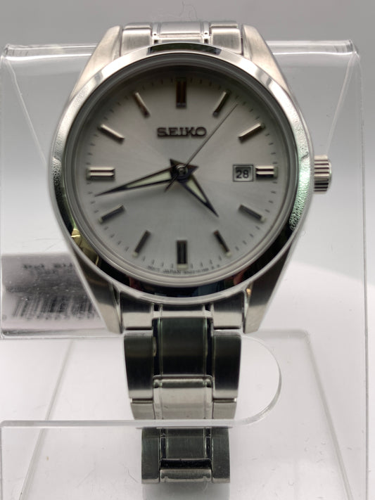 Seiko SUR633- 30mm Stainless steel case. Silver sunray dial. Sapphire crystal. 6n22 quartz movement. 100m water resistance. Box and papers.