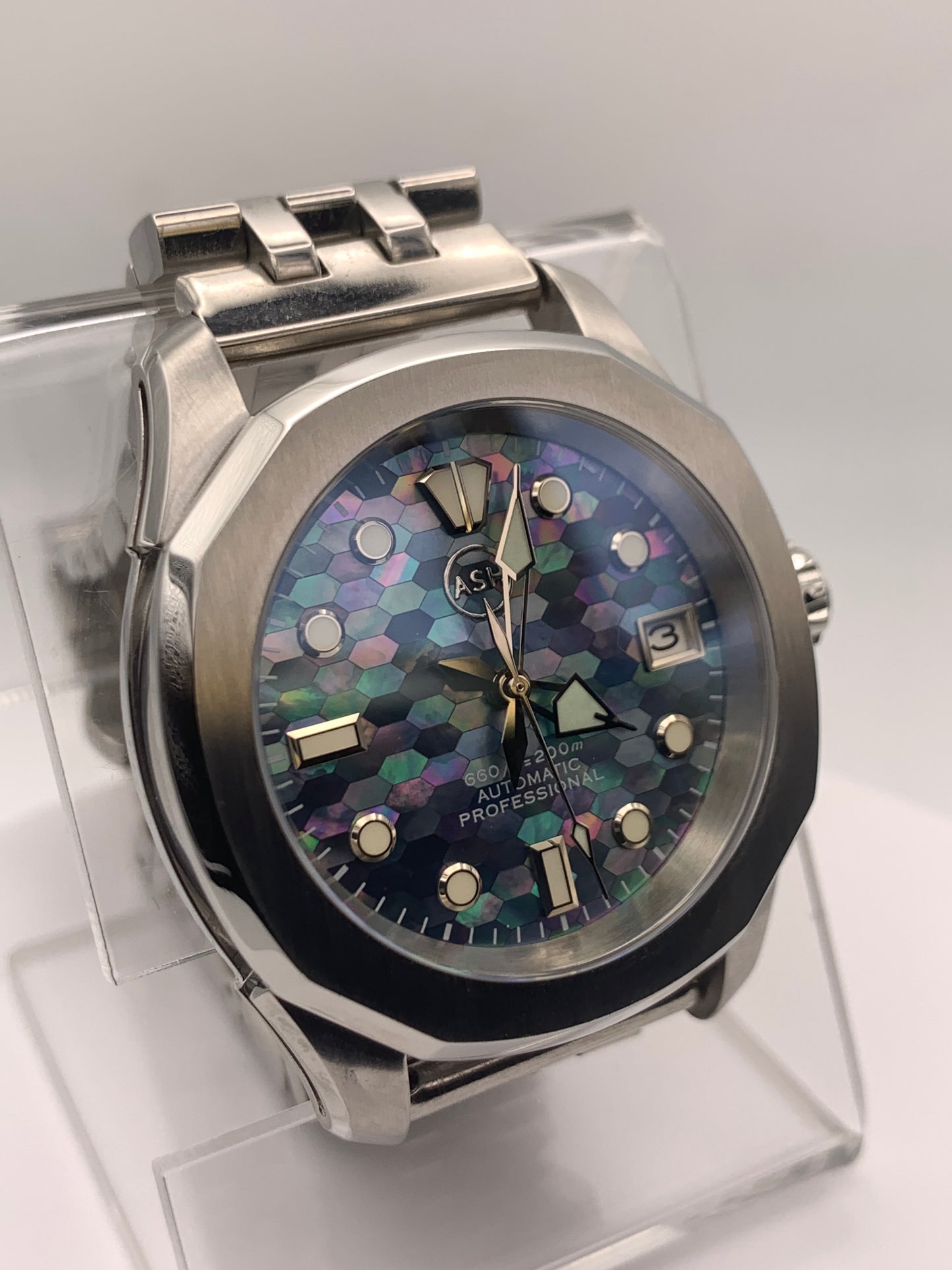 Spectrum. Mosaic mother of pearl dial. 38mm Stainless steel case. Sapphire crystal. NH35 automatic movement.