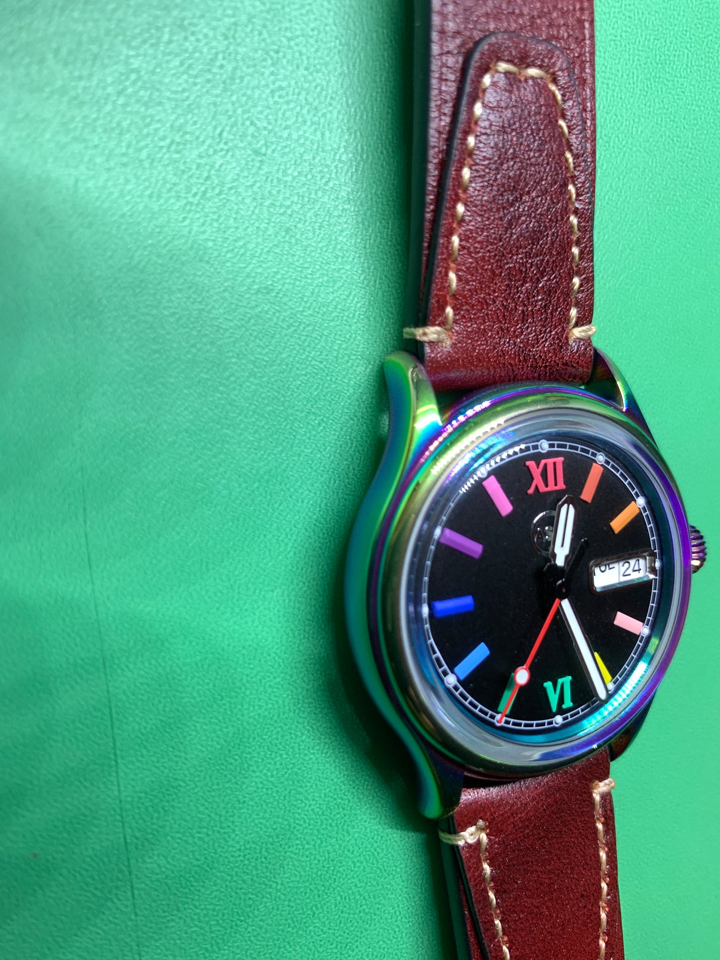 Living Color. 38mm thermally colored stainless steel case and case back. Double dome K-1 mineral crystal. Seiko NH36