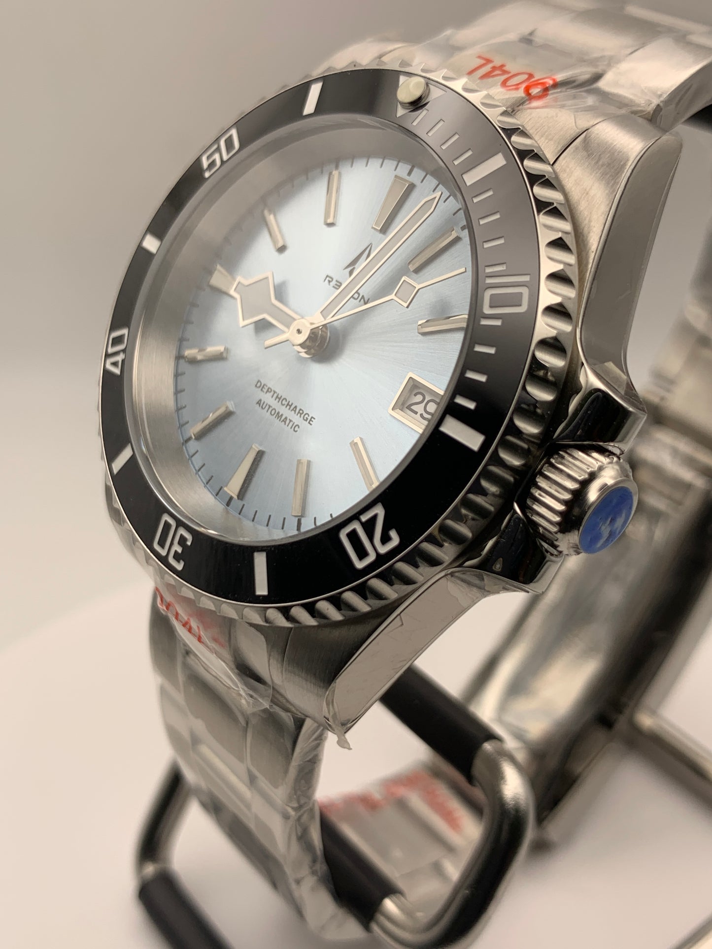 R3CON Collection. Custom light blue dial watch. 40.5mm stainless steel case. Sapphire crystal. Seiko NH35.