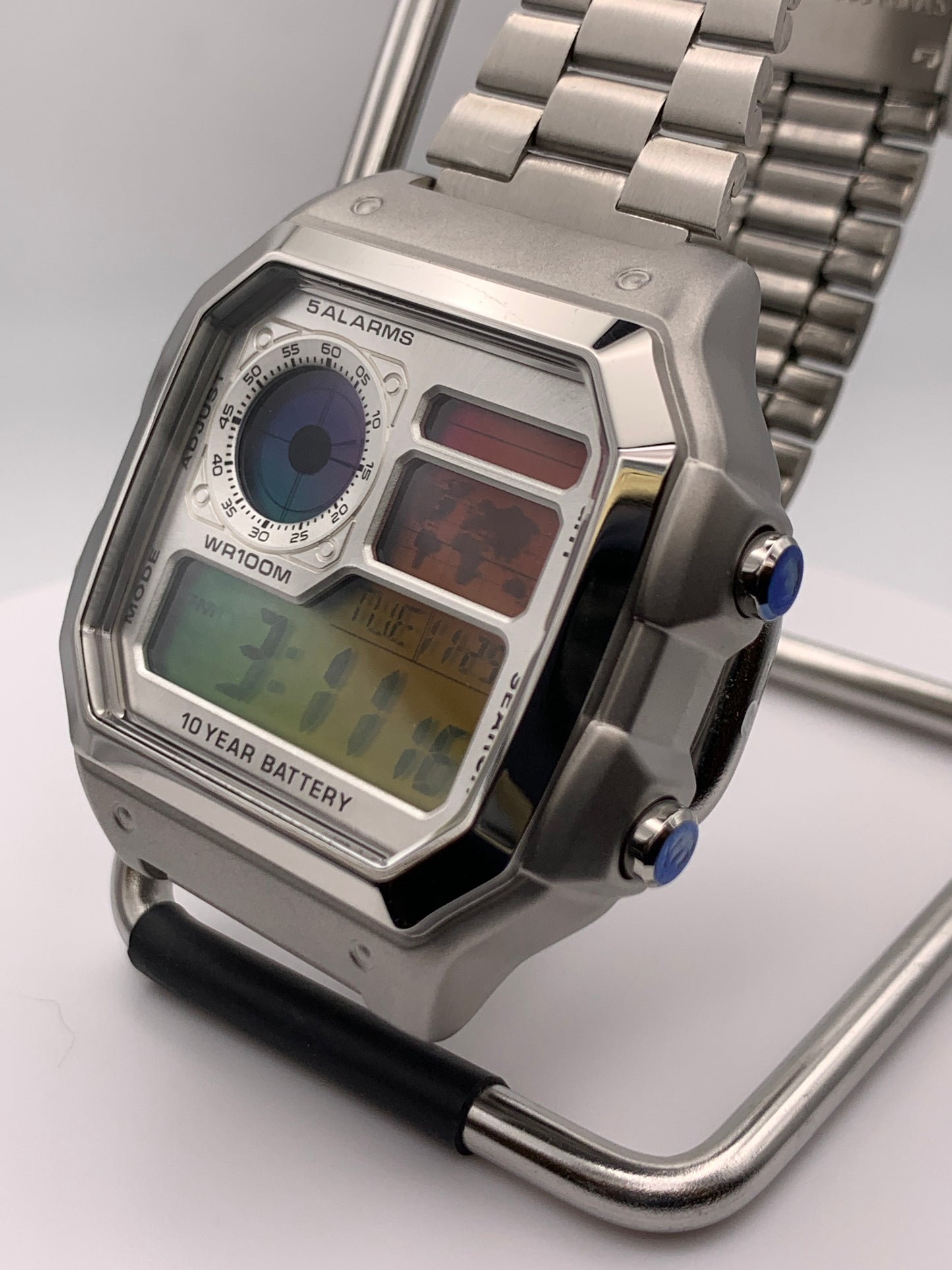 ‘Sold. Royale with Cheese. Casio AE1200. Rainbow filter. Metal case. Silver sunray faceplate. Vintage style bracelet. Flashing alarm upgrade.