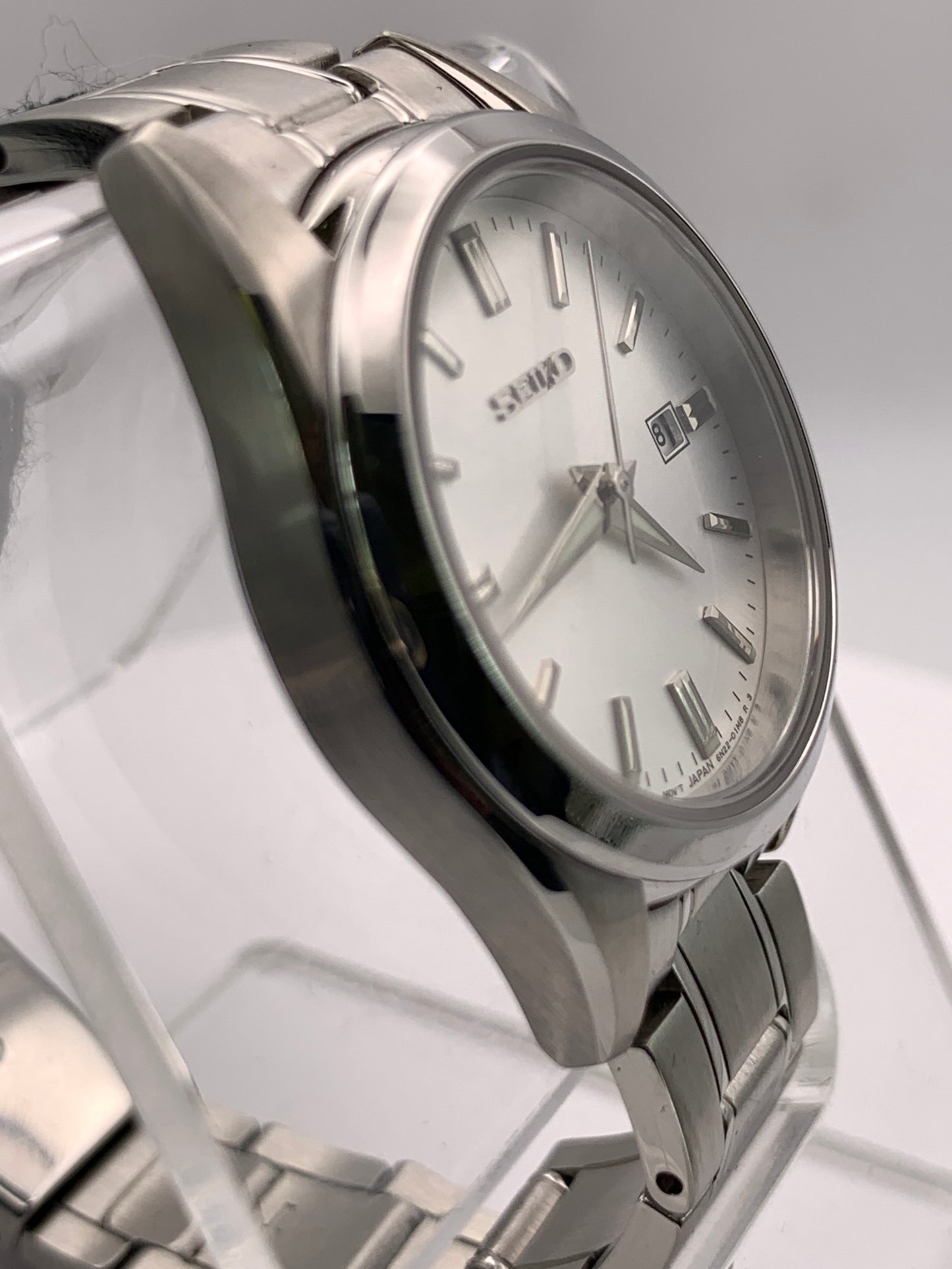 Seiko SUR633- 30mm Stainless steel case. Silver sunray dial. Sapphire crystal. 6n22 quartz movement. 100m water resistance. Box and papers.
