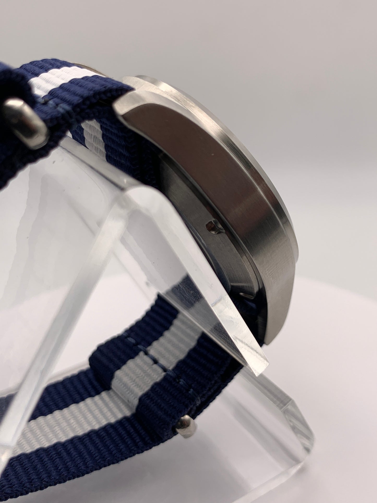 Cloth & Steel. 38mm brushed stainless steel. Ornate dial. Sapphire crystal. Seiko NH38
