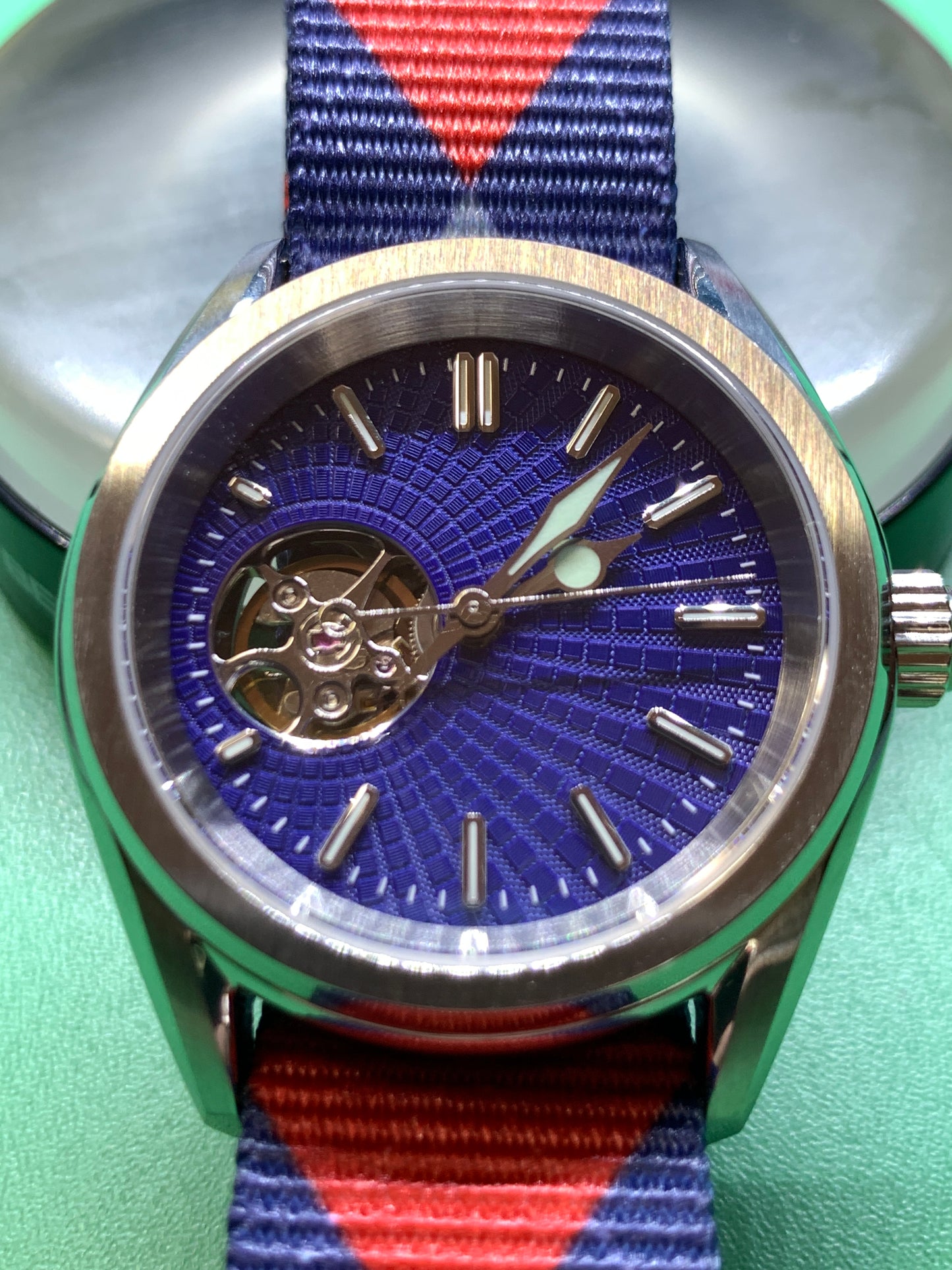 Blue Shift.  38mm Stainless steel. Sapphire crystal.  Seiko NH38.