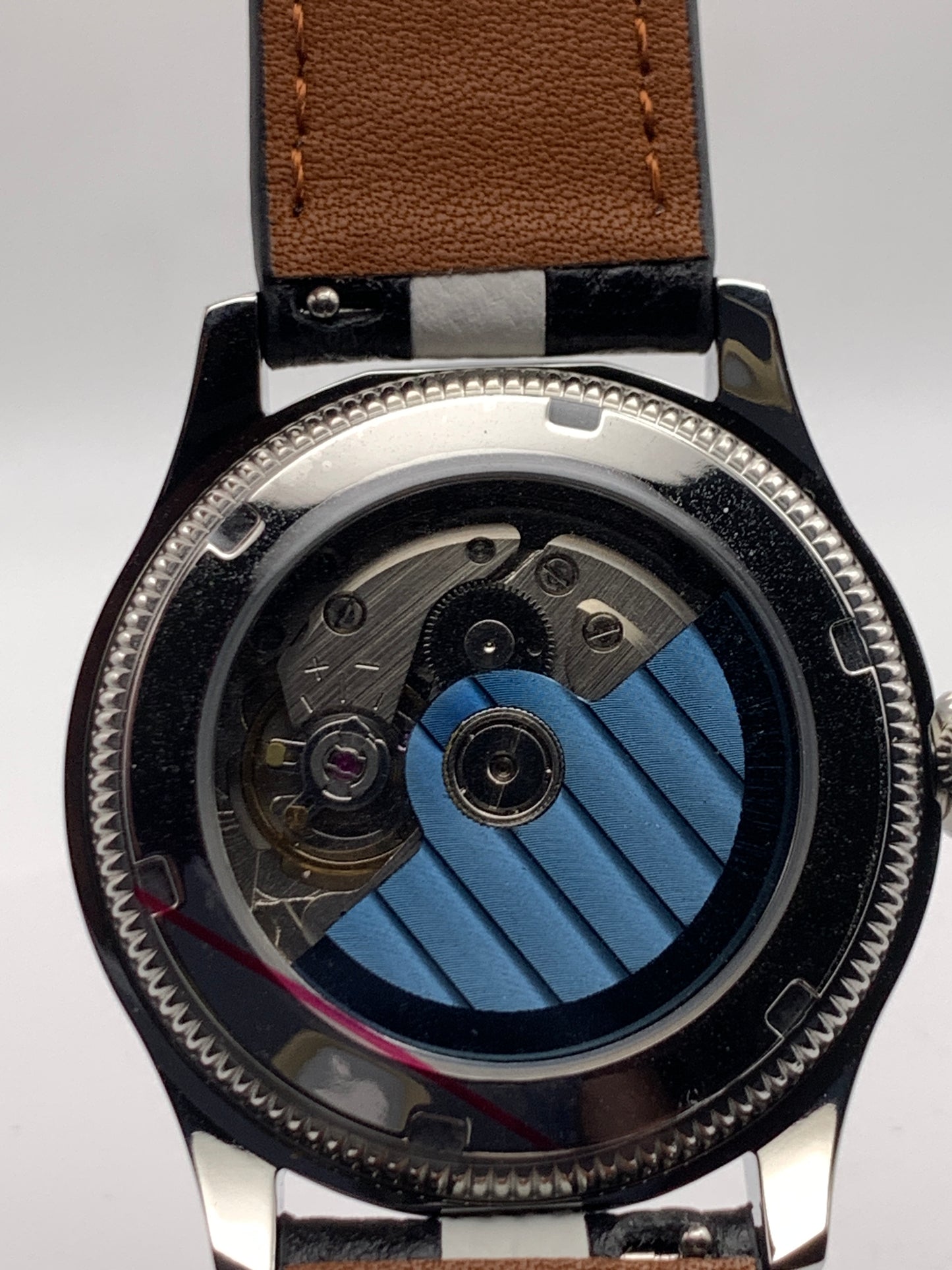 Thereabouts - One hand watch. 38mm coin edged stainless steel case. Enamel dial. Boxed K-1 crystal. Exhibition case back with blue custom rotor. Seiko NH38.