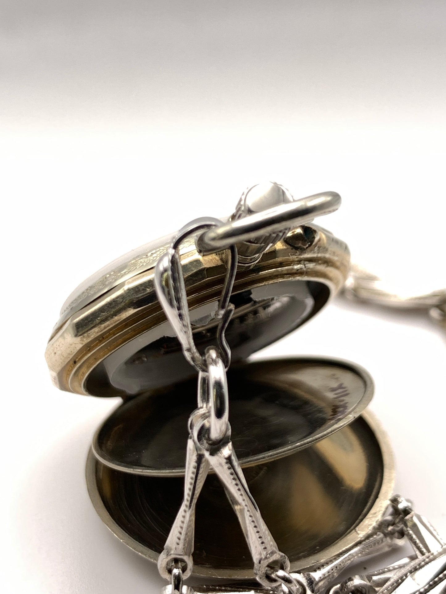 ‘Sold - Amuse-bouche. 30mm pocket / necklace watch. NOS Argentan alloy case and hand painted enamel dial. Sapphire crystal. Miyota 2036. 24” sterling necklace.