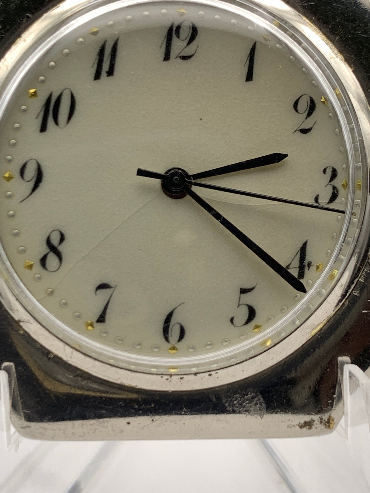 Palimpsest.  40 x 40mm plated brass case. Vintage pendant watch conversion. Domed acrylic crystal. Original enamel dial. Miyota 2036.