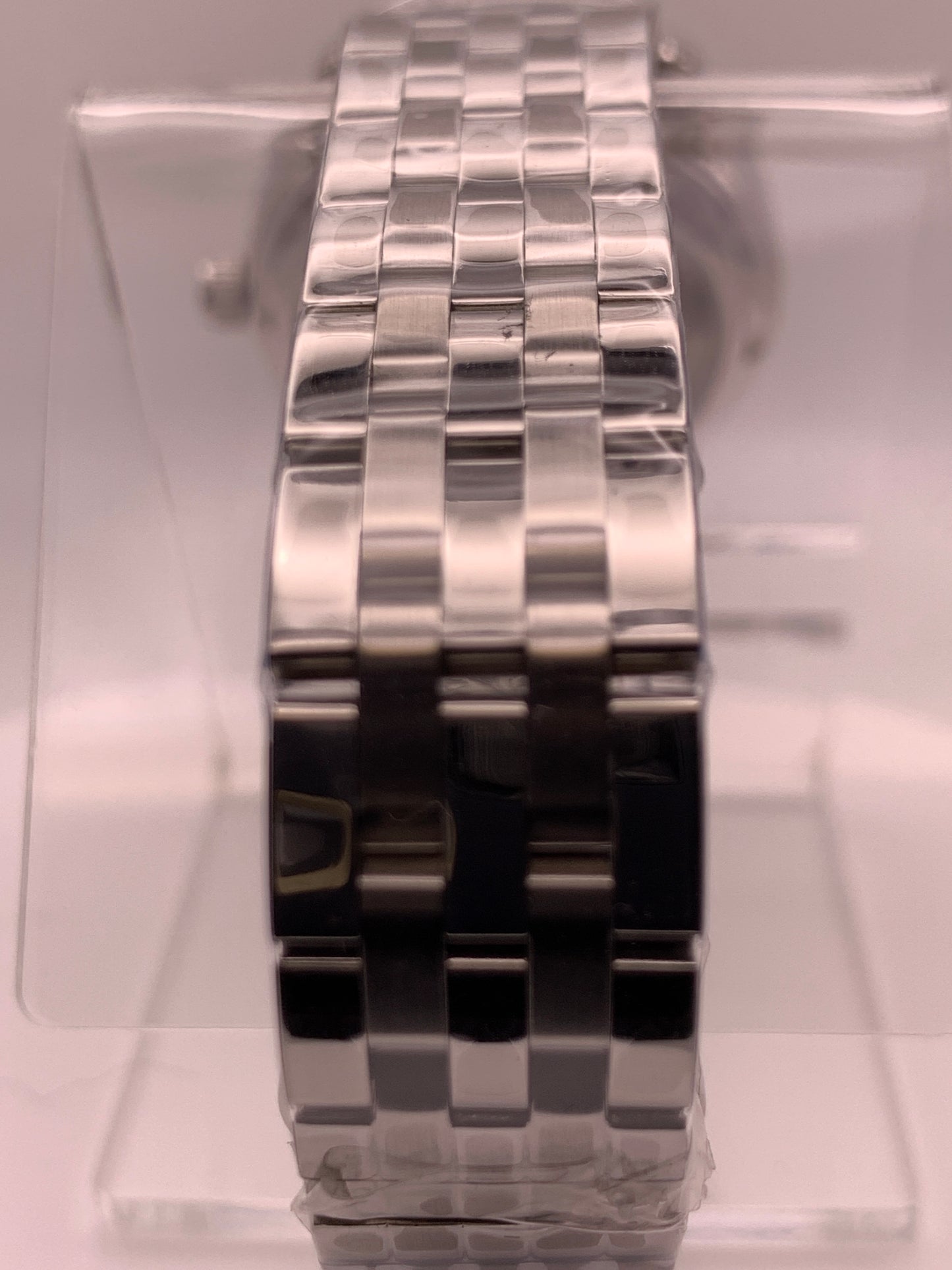 The Teal. Highly figured dress watch. 33mm stainless steel case. Faceted and domed acrylic crystal. NH35.