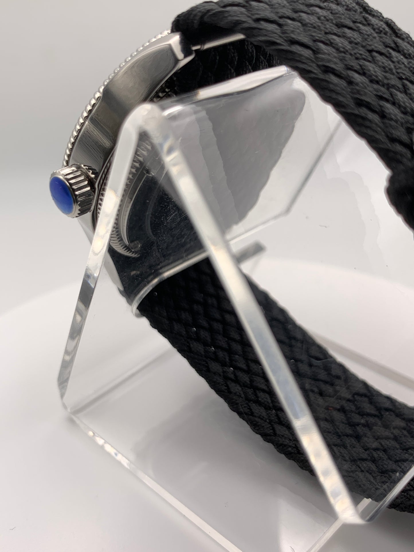 Homesick. 39mm Coin edged stainless steel case. Tobacco sunburst figured dial. AR coated domed mineral glass crystal. Seiko NH35 automatic movement.