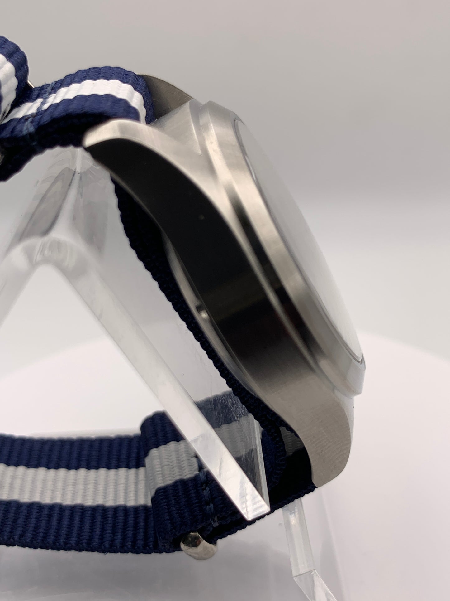 Cloth & Steel. 38mm brushed stainless steel. Ornate dial. Sapphire crystal. Seiko NH38
