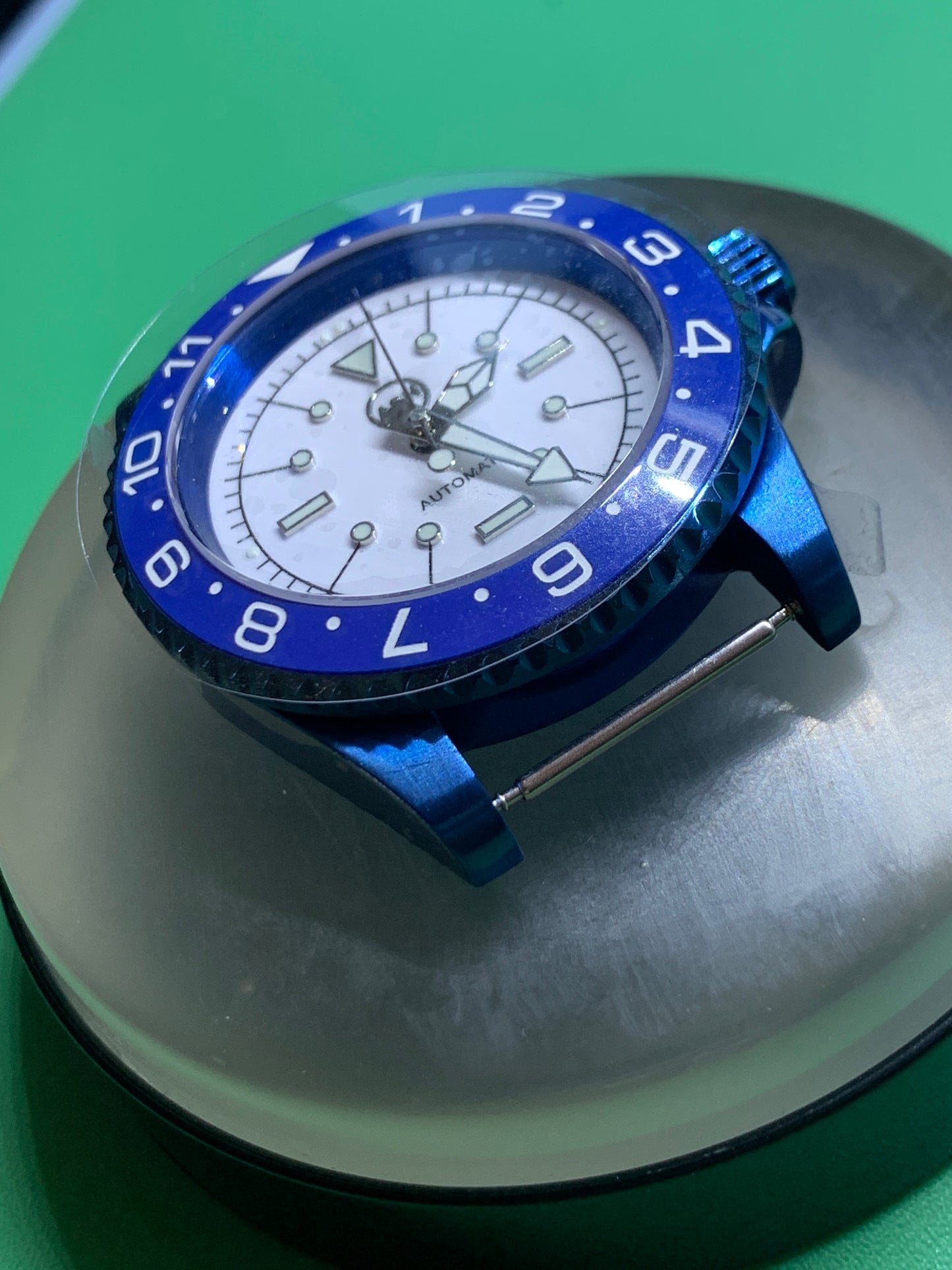 Europa - 41mm Blue anodized stainless steel case. Sapphire crystal. Seiko NH38.