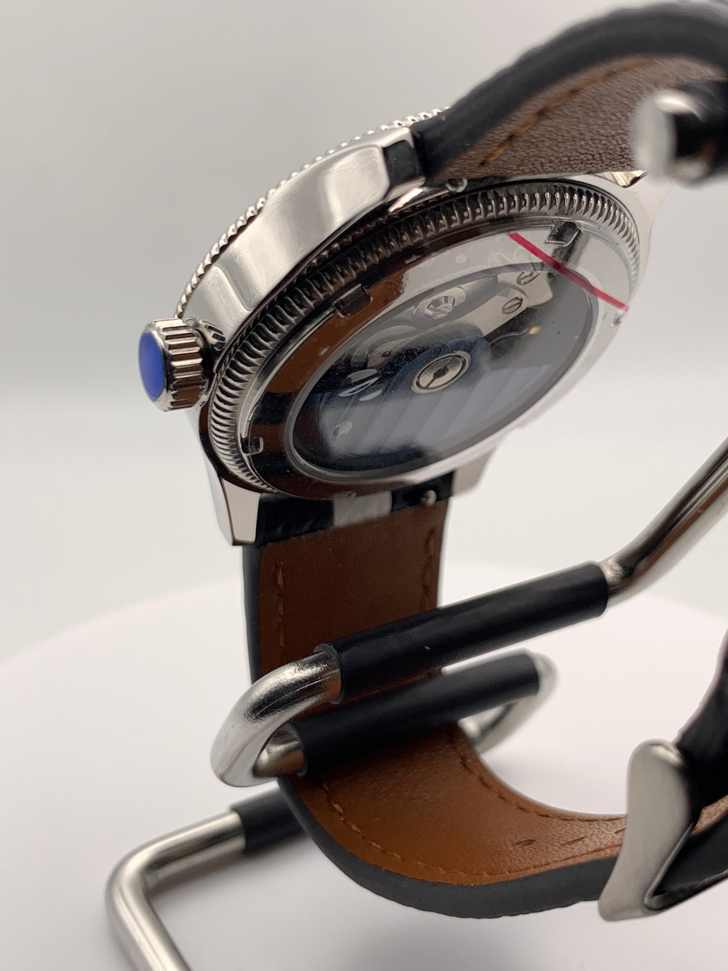 Thereabouts - One hand watch. 38mm coin edged stainless steel case. Enamel dial. Boxed K-1 crystal. Exhibition case back with blue custom rotor. Seiko NH38.
