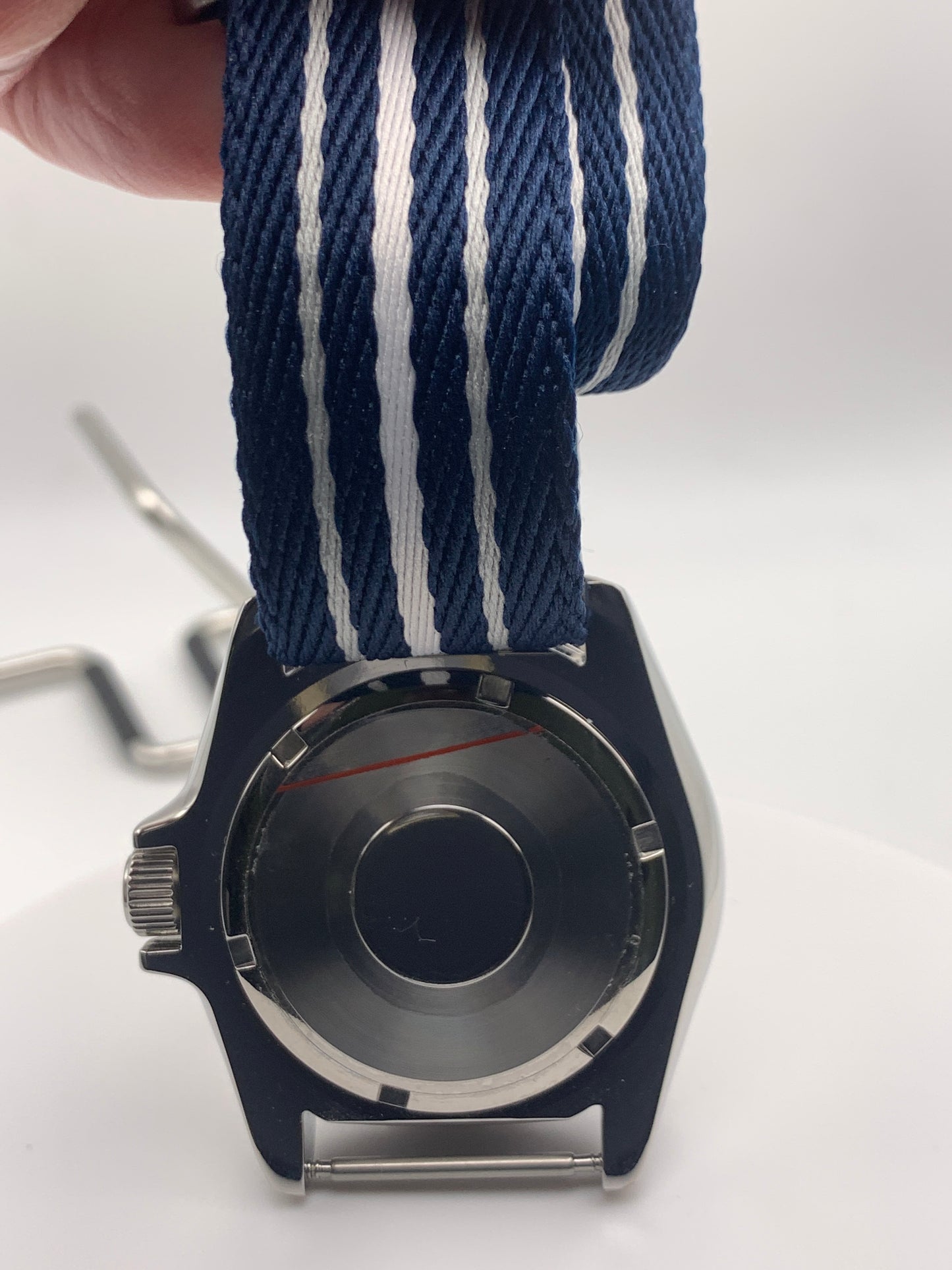 Pinwheel. 41mm Stainless steel case. Crystal titanium dial. Sapphire crystal. Unidirectional bezel. Seiko NH35.