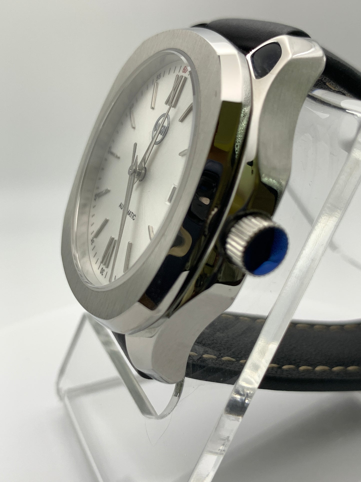 40mm Silver on silver dress watch.