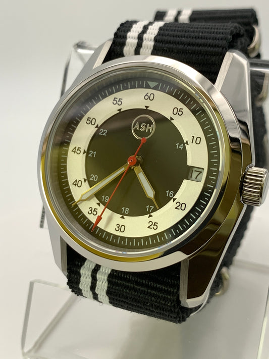 Black Eye. 39mm Stainless steel case. Flieger B style dial. Sapphire crystal. Miyota 8215 automatic.