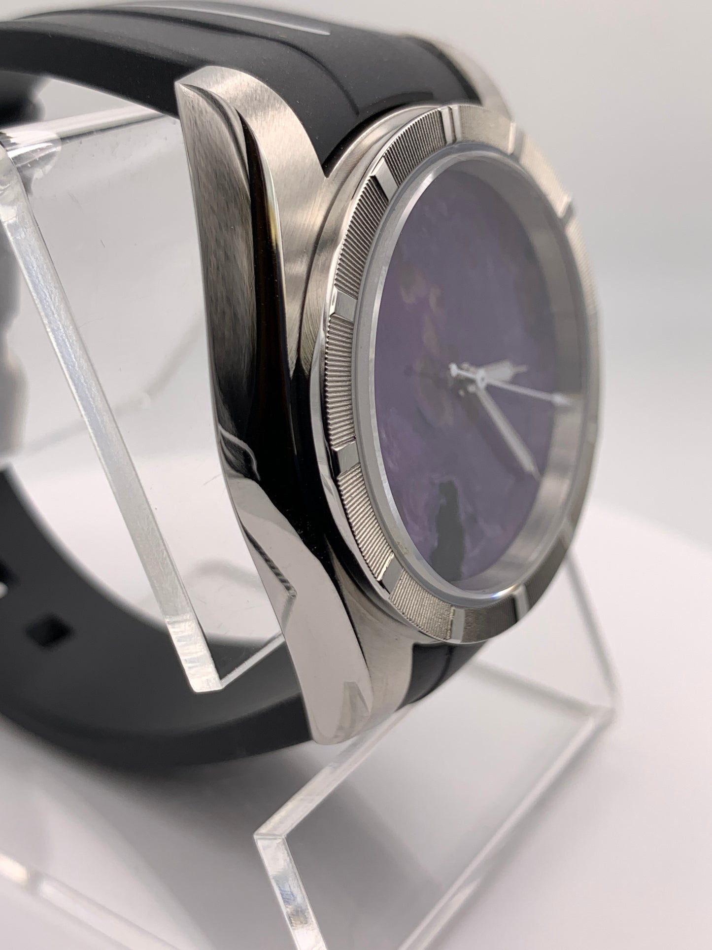 Purple natural stone dial. 39mm engine turned case.