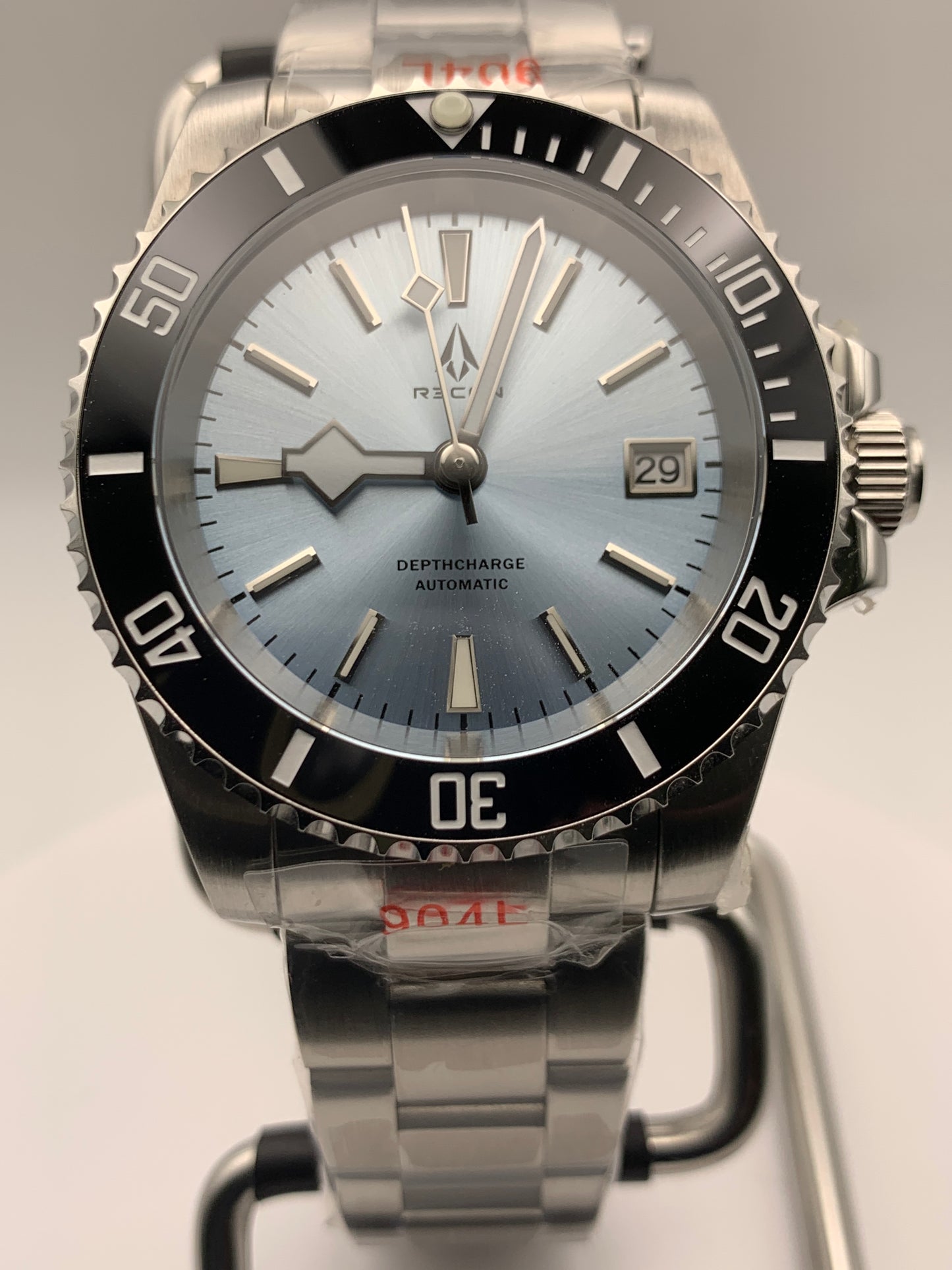 R3CON Collection. Custom light blue dial watch. 40.5mm stainless steel case. Sapphire crystal. Seiko NH35.