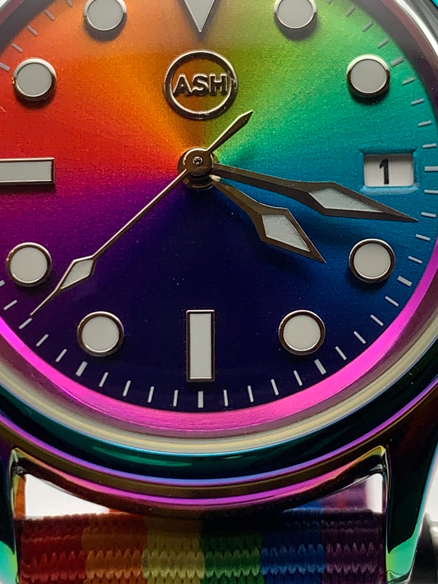 Portable rainbow. 38mm thermally colored stainless steel case and case back. Double dome K-1 mineral crystal. Seiko NH35.