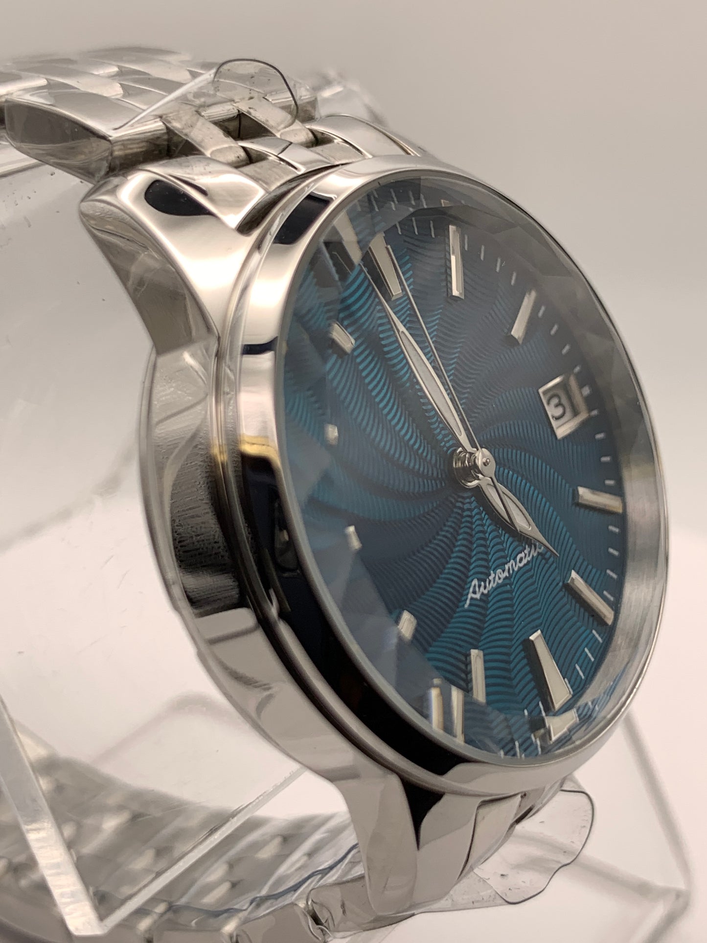 The Teal. Highly figured dress watch. 33mm stainless steel case. Faceted and domed acrylic crystal. NH35.