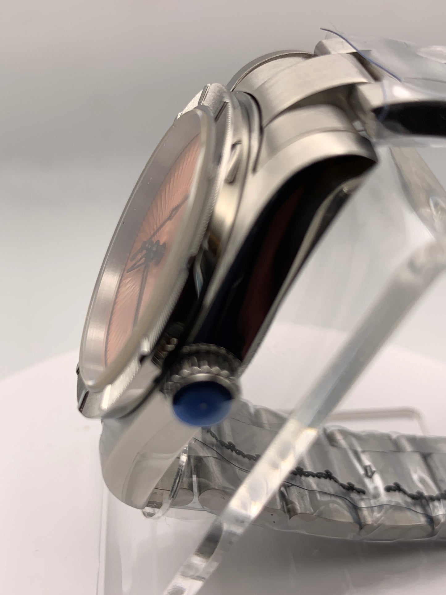 Sunbeam. 39mm stainless steel case and matching bracelet. Textured dial and unique handset. Sapphire crystal. NH38 automatic movement.