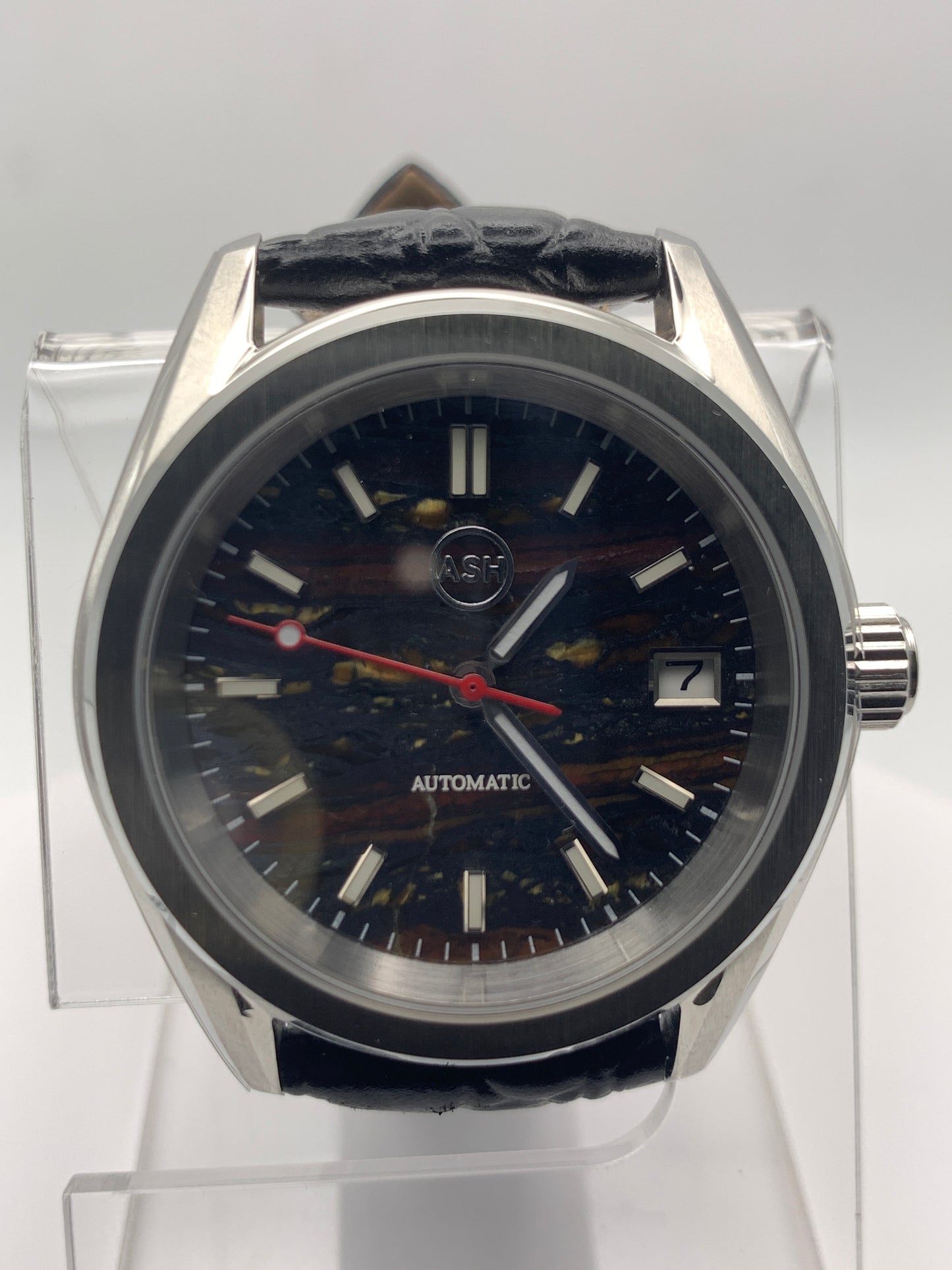 Agharta. 39mm Stainless steel. Iron Tiger Eye dial. Sapphire crystal. Seiko NH35.
