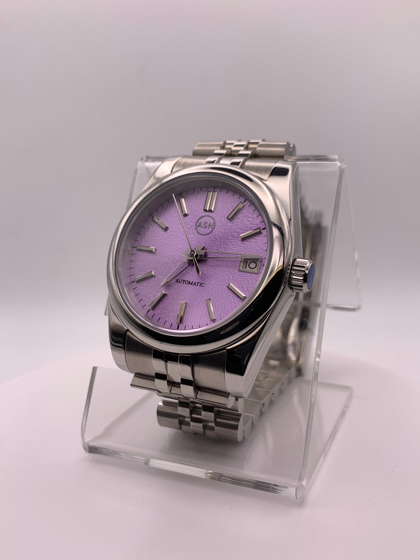 ‘Sold - Highly figured lavender dial. 36mm sport watch on bracelet.