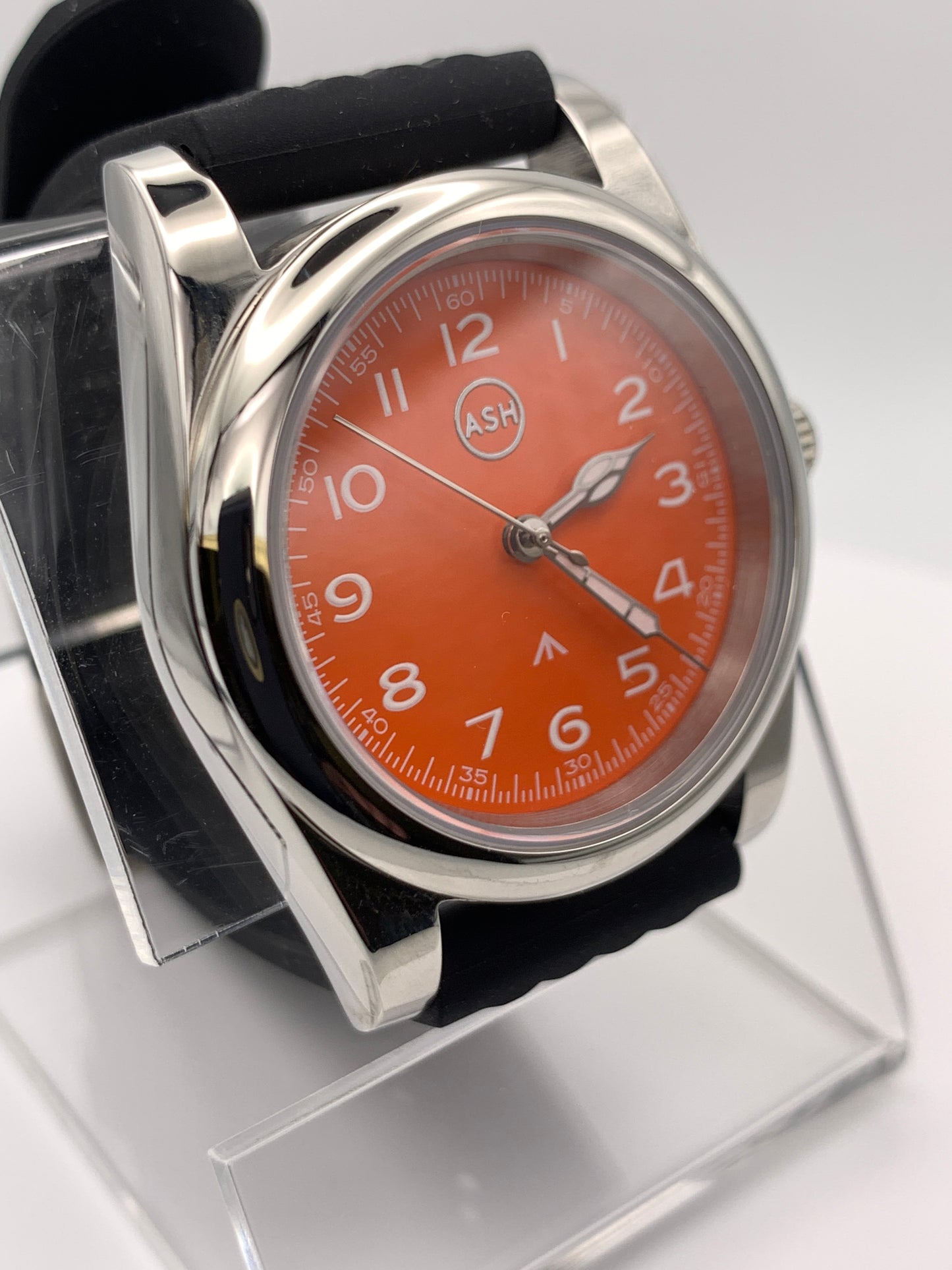 Blood Orange.  39mm stainless steel field watch. Sapphire crystal. NH38 automatic.