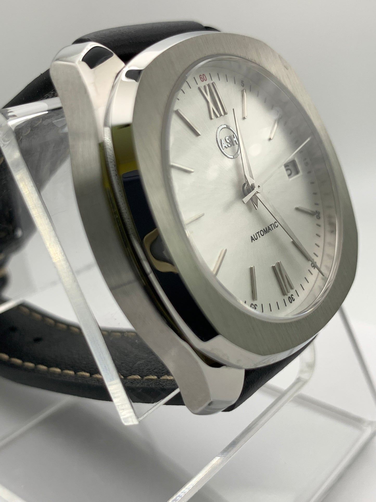 40mm Silver on silver dress watch.
