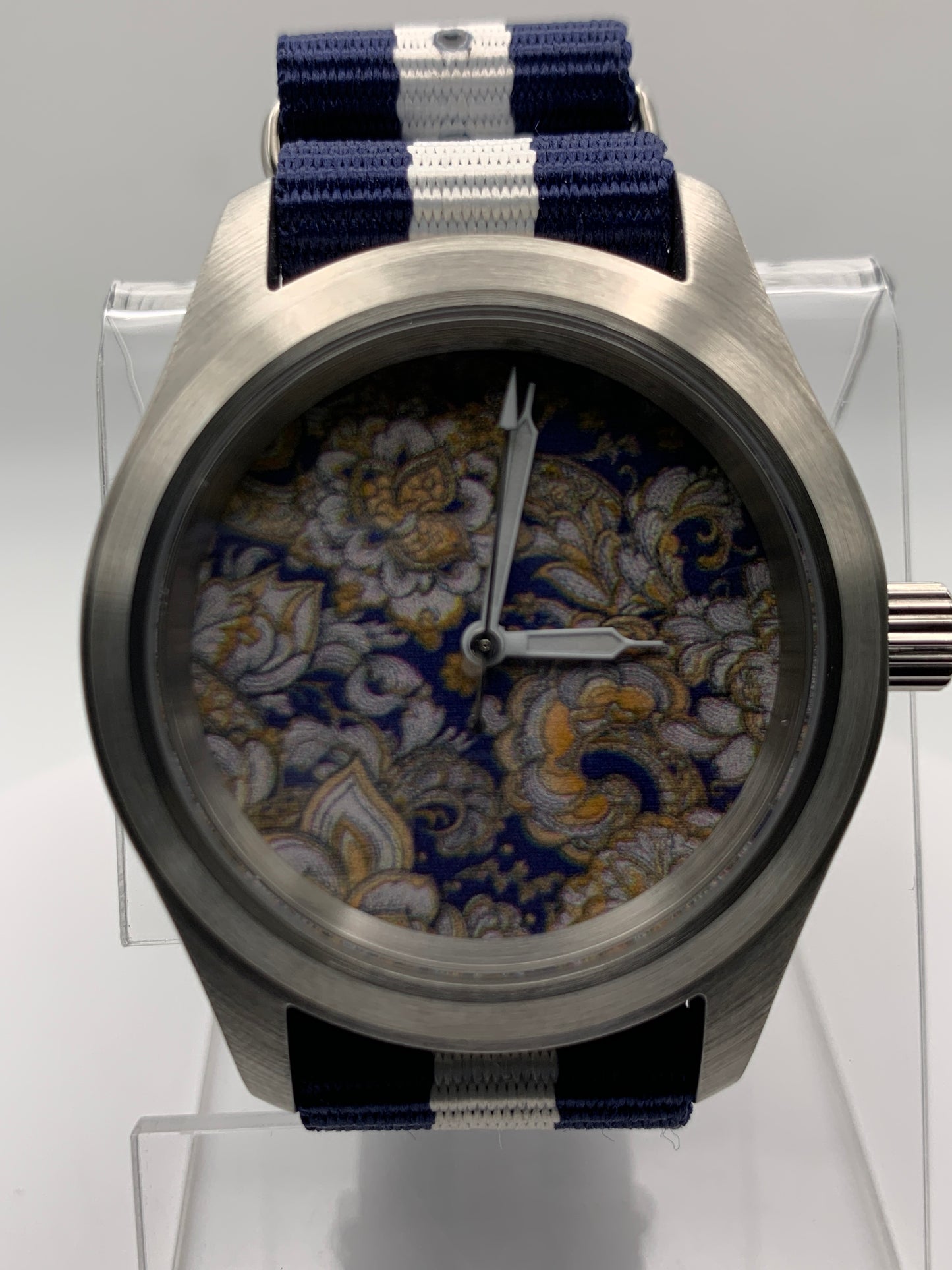 Cloth & Steel. 38mm brushed stainless steel. Ornate dial. Sapphire crystal. Seiko NH38
