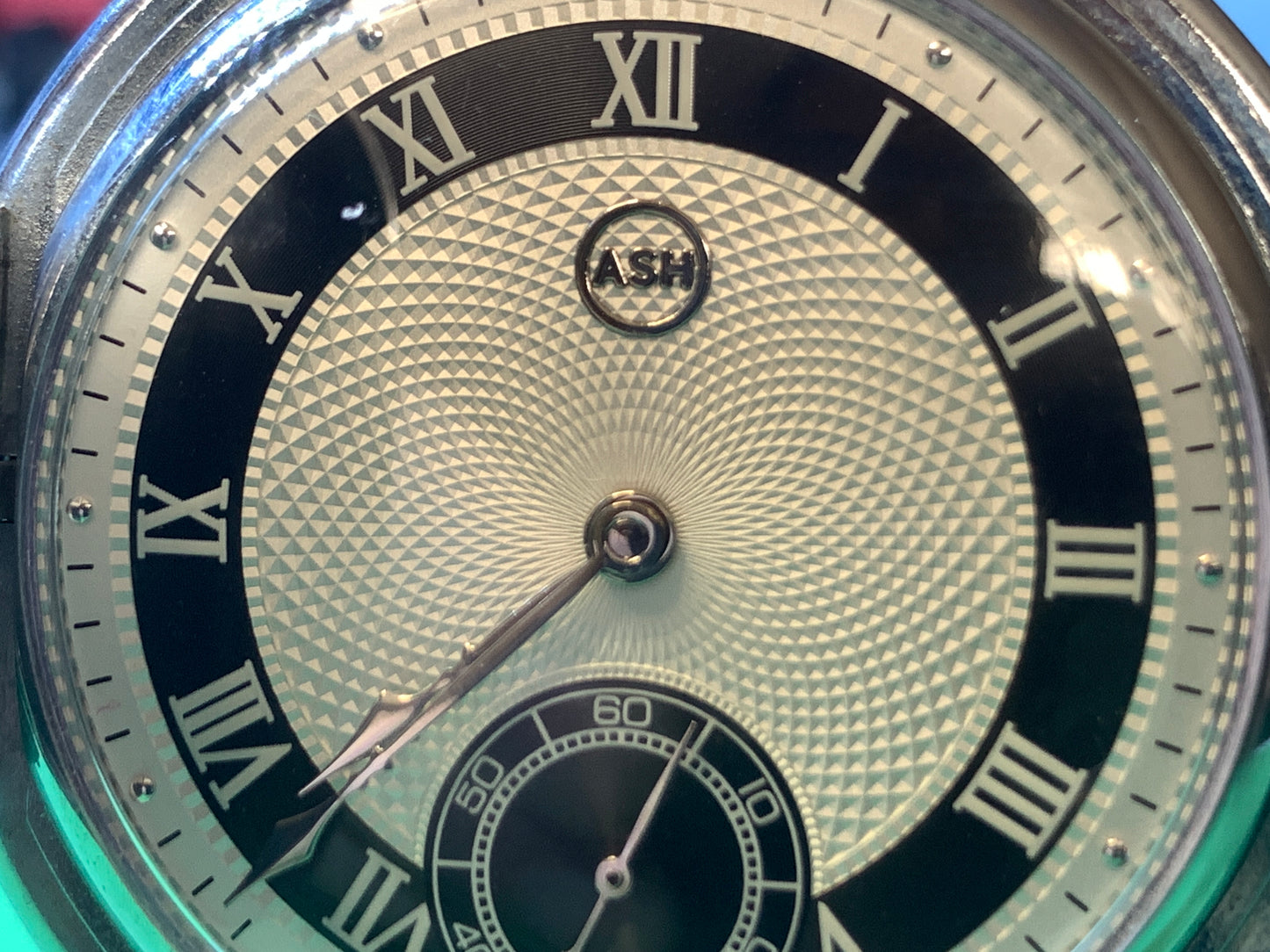 White Dahlia. All Swiss pocket watch. Beautiful NOS ETA/Unitas hammertone 6498 hand wound movement. Guilloche dial. Vintage 47mm case with perlage.