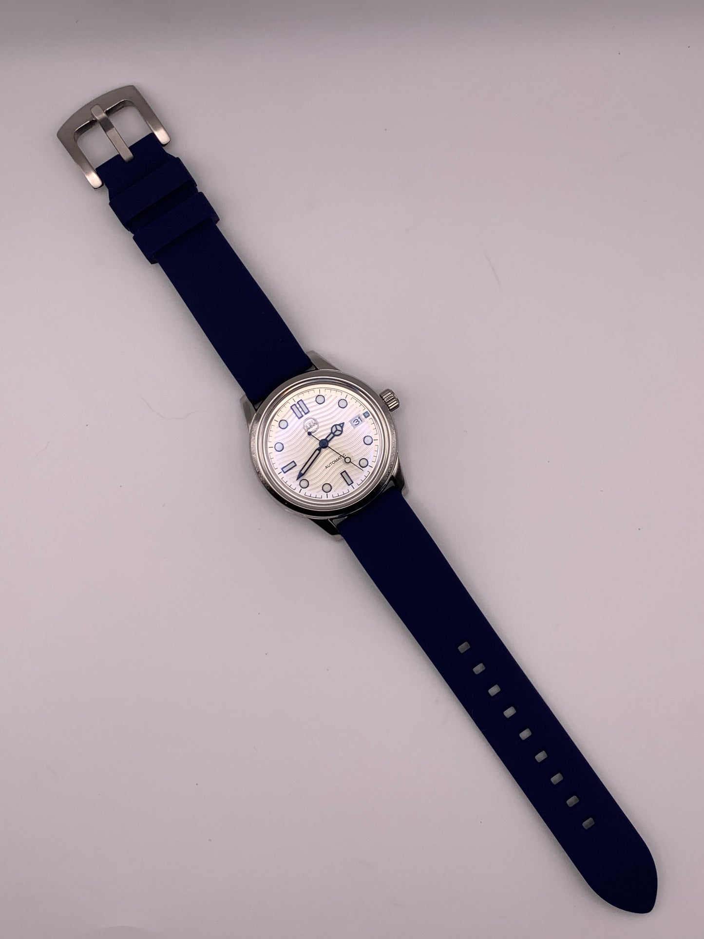 The Yankee 1.1 - Blue, silver and white livery. 39mm stainless steel case. K-1 mineral crystal with AR. NH35 automatic.